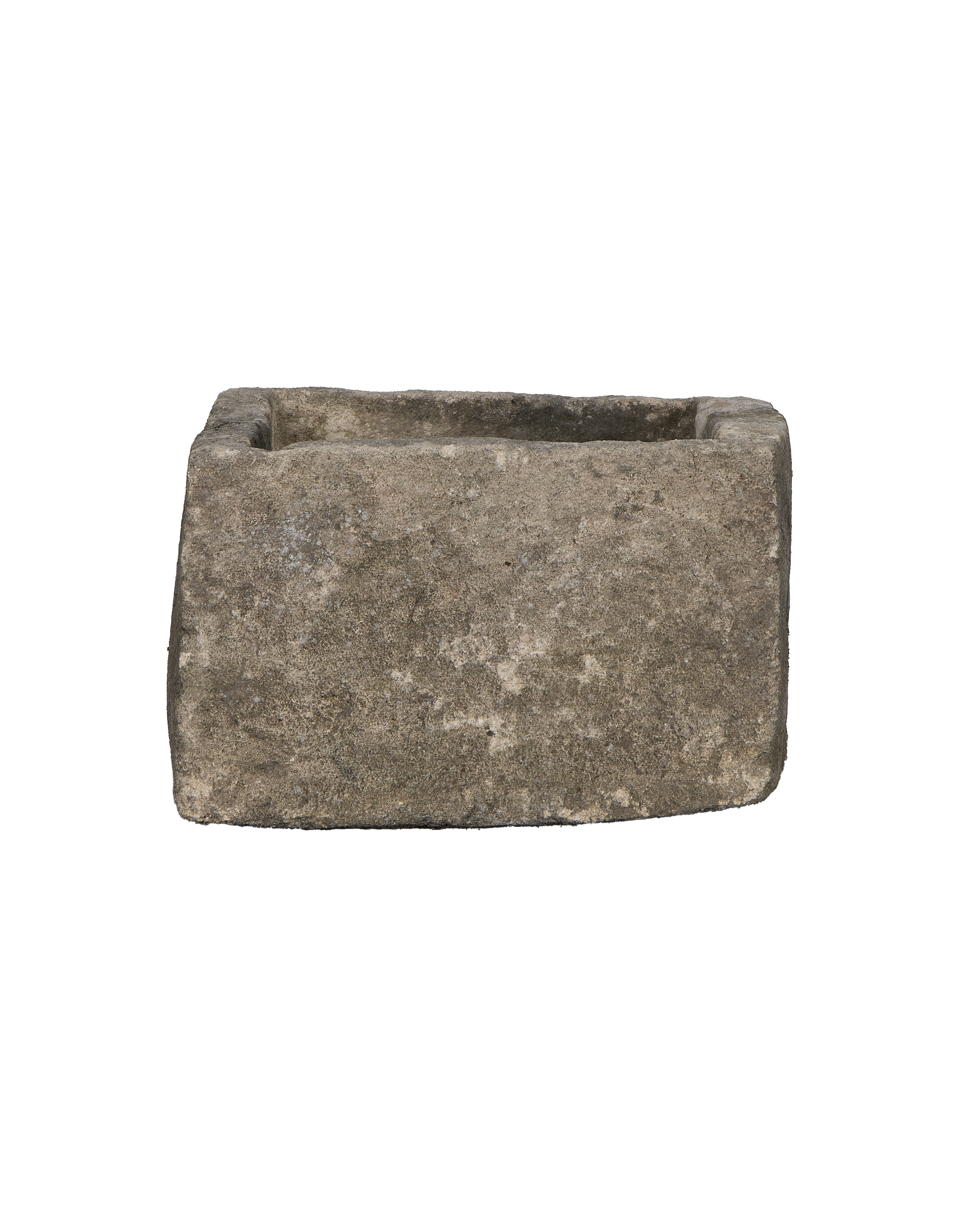 Vintage Indonesian rectangular limestone trough showing rough textured stone side.