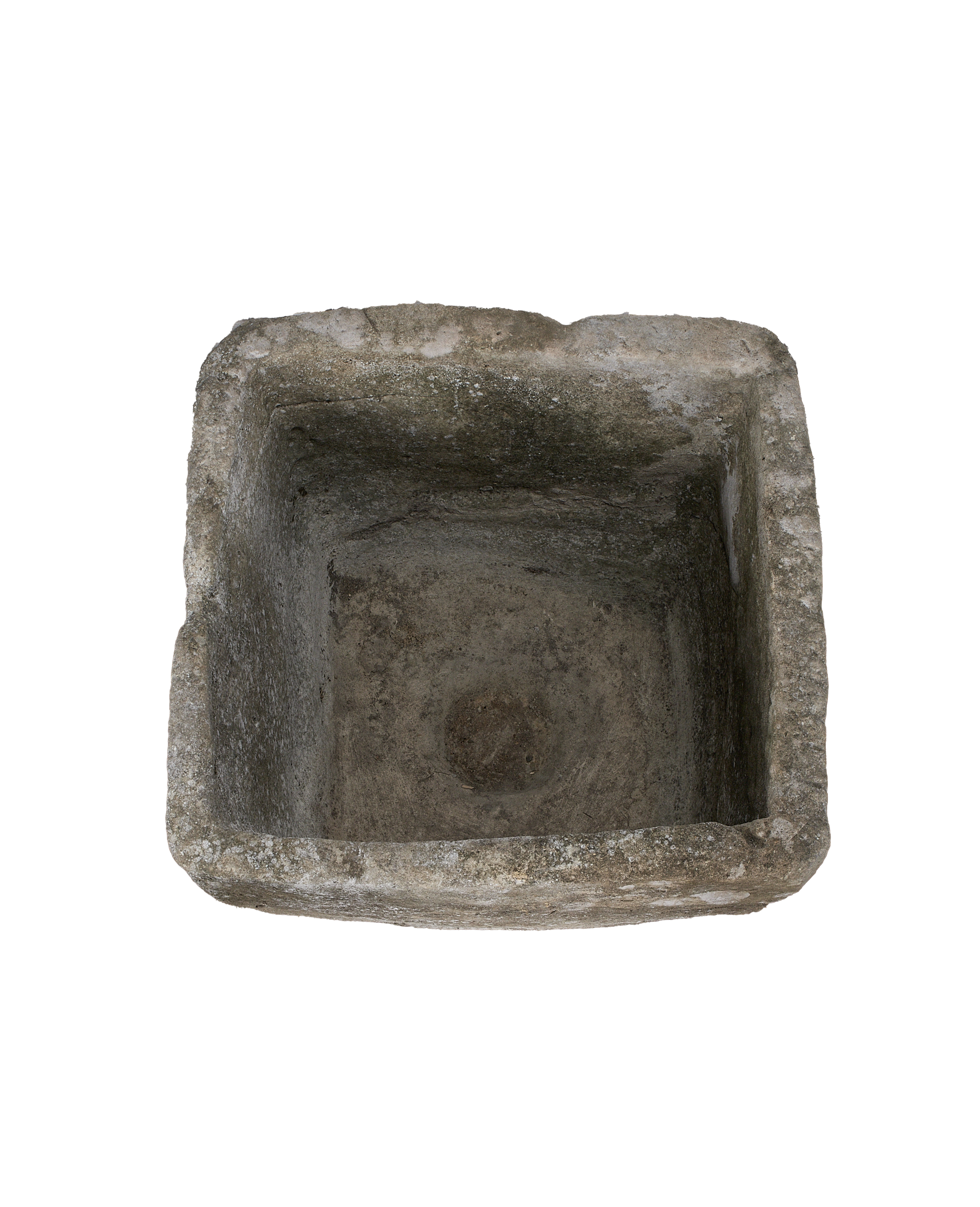 Vintage Indonesian limestone trough, top-down view highlighting the weathered interior texture.