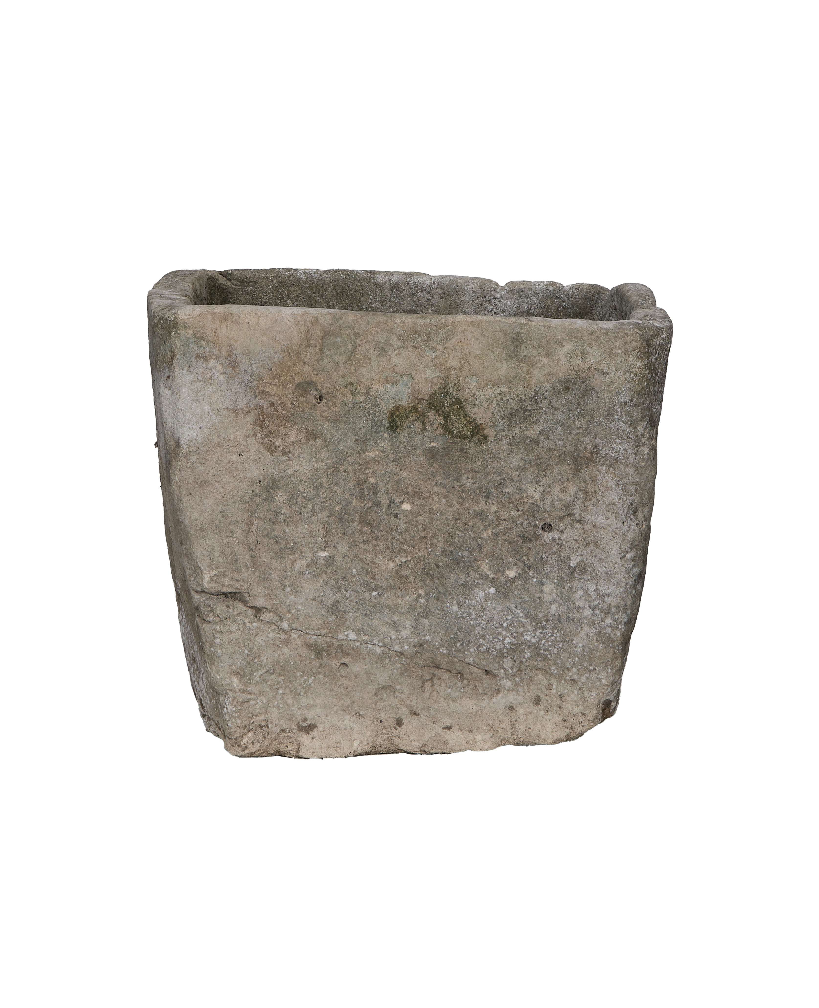 Vintage rectangular limestone trough, showing weathered texture, uneven surface, and green moss detail.