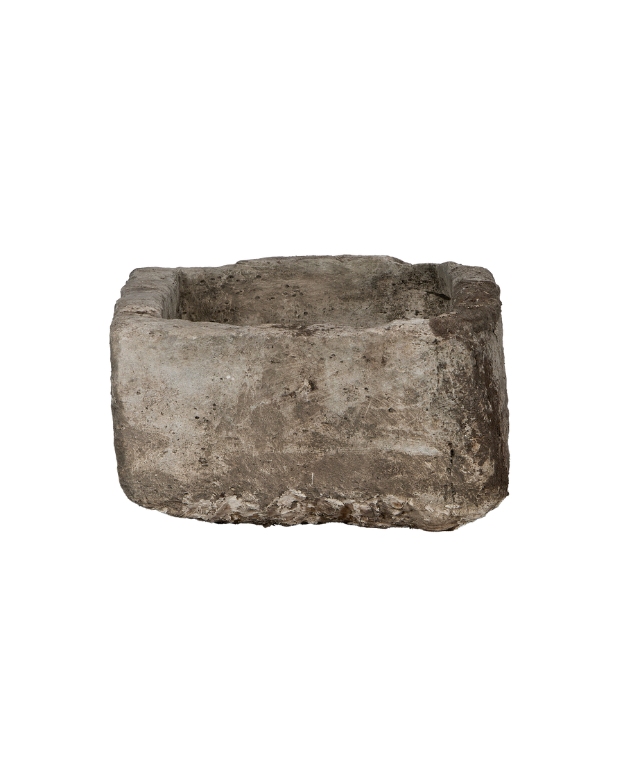 Vintage Indonesian rectangular limestone trough, top-down view highlighting aged, weathered texture and rough edges.