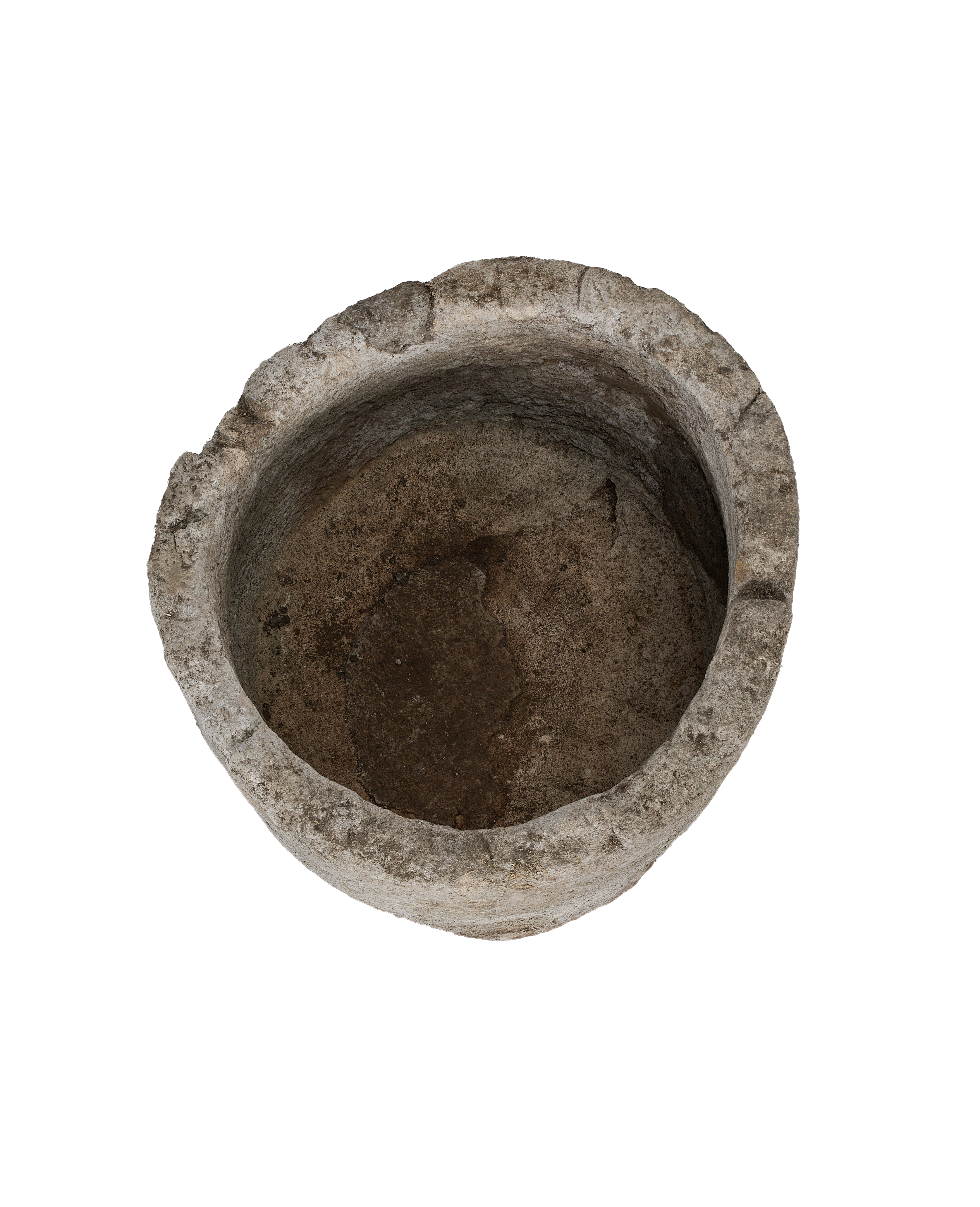 Vintage Indonesian round limestone trough, top-down view showing interior texture and depth.