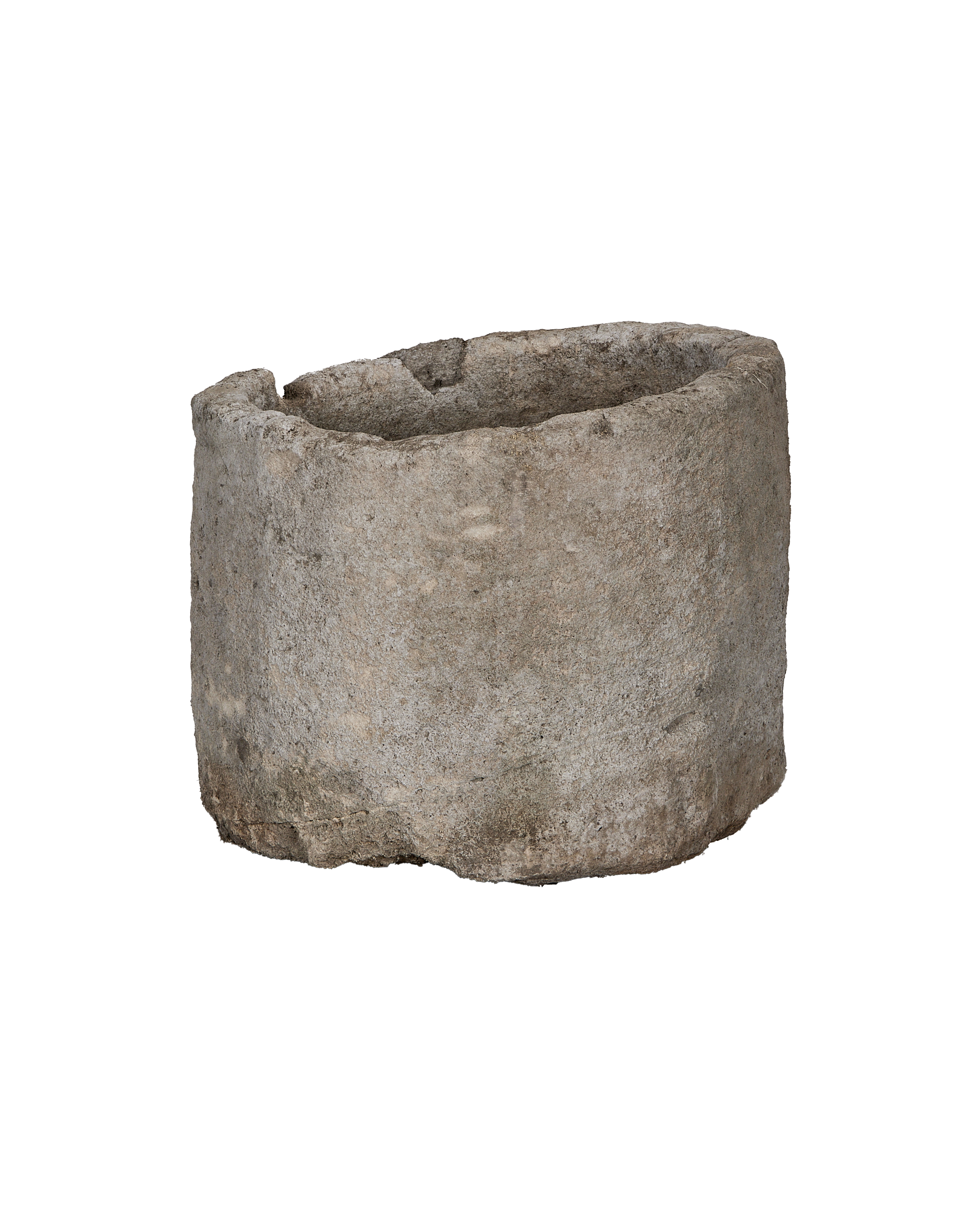 Vintage round limestone trough from Indonesia with a weathered, textured surface.
