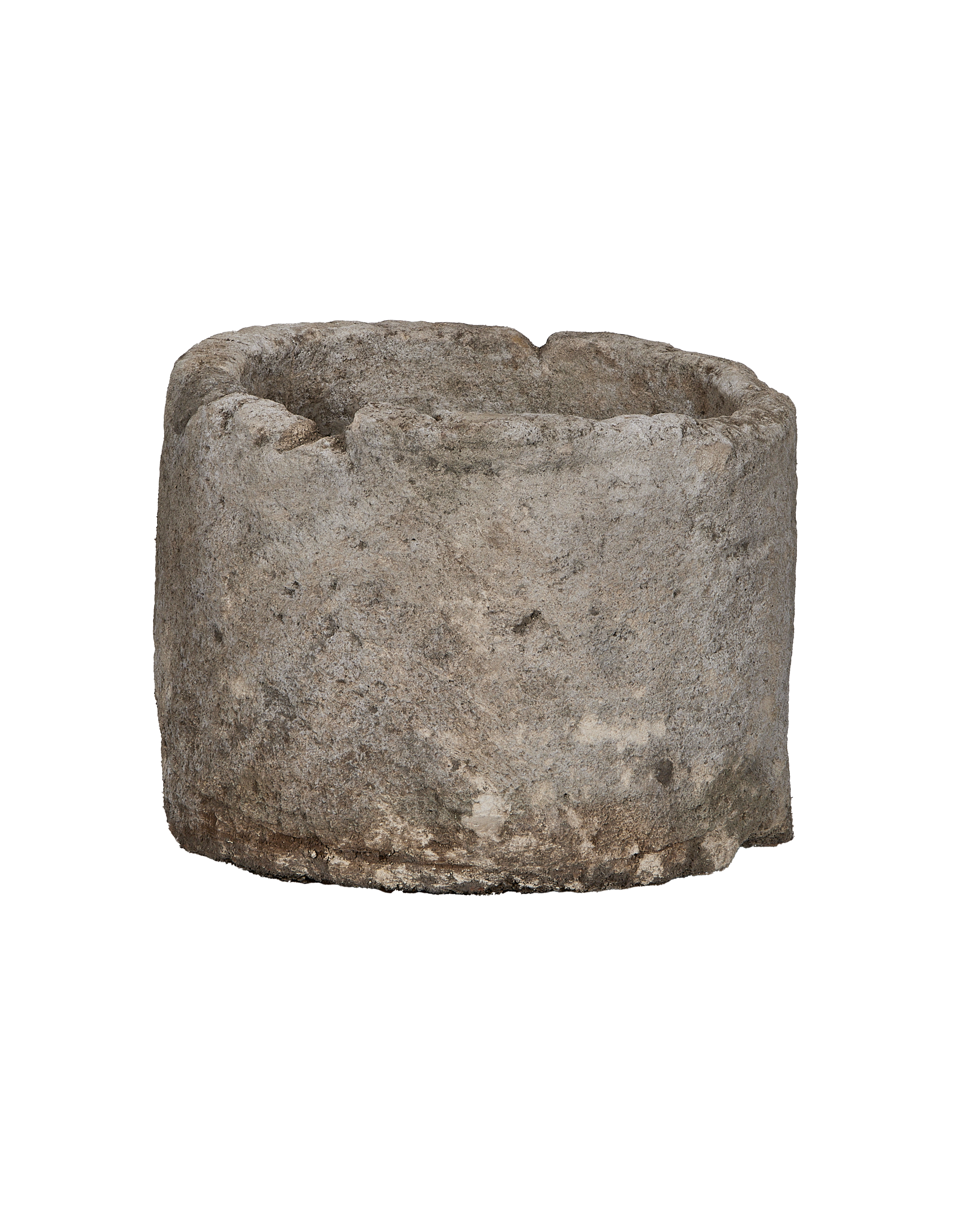 Vintage Indonesian limestone trough (OAK), round, showing the rough, weathered texture and uneven rim.