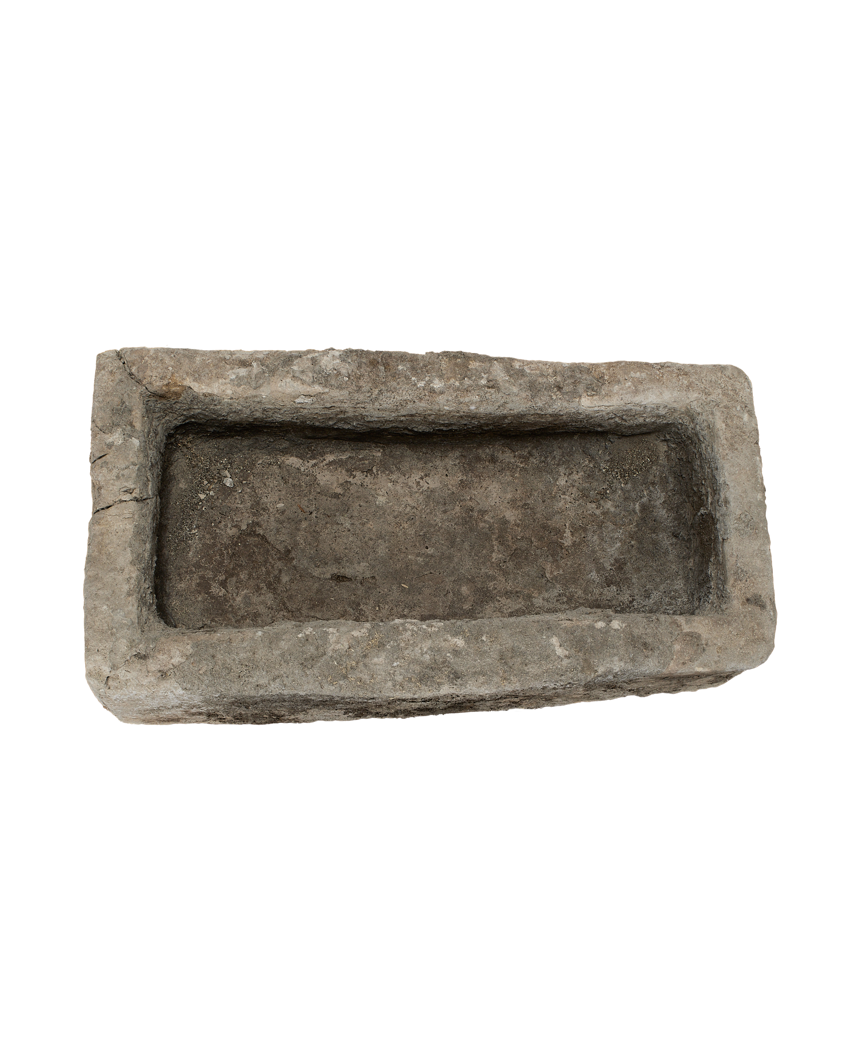 Vintage Indonesian limestone trough, top view inside showing aged, textured surface.