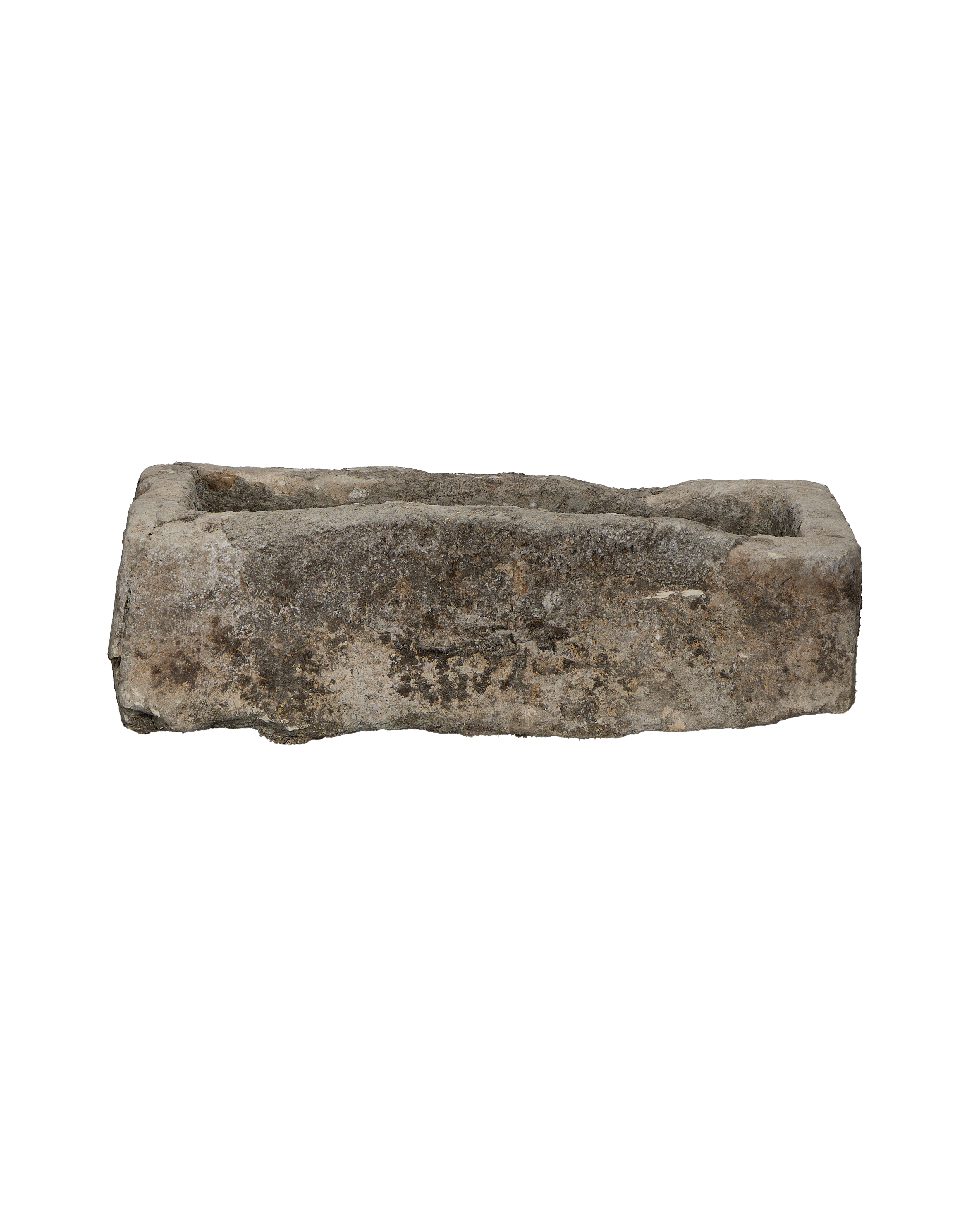 Vintage Indonesian limestone trough, rectangular, with rough, weathered texture condition, studio shot.