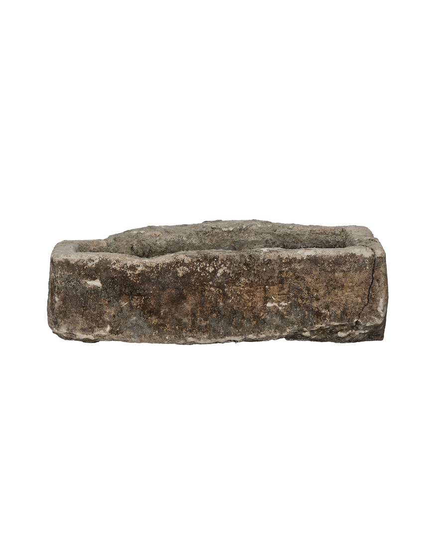 Vintage Indonesian limestone trough, rectangular, showcasing rugged texture and weathered gray surface.