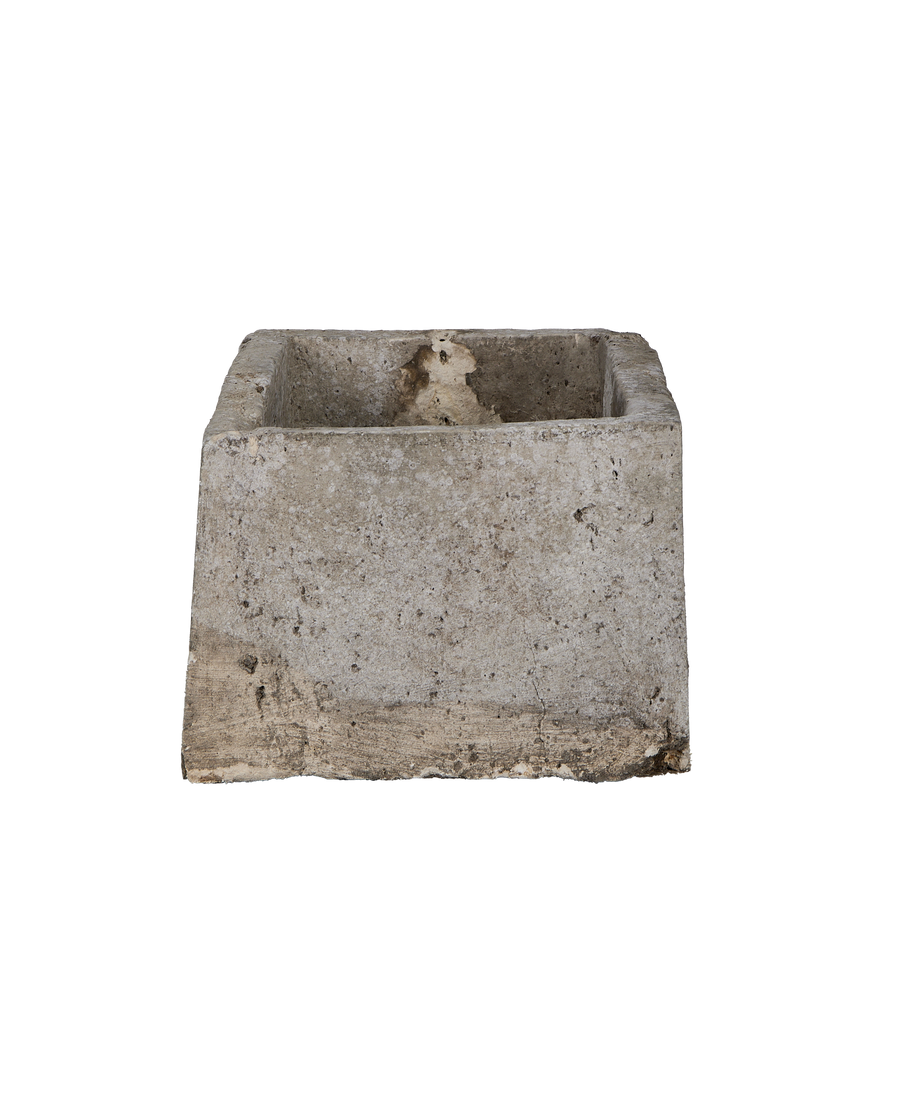 Vintage Indonesian limestone trough, grey weathered rectangle with visible rough interior texture.