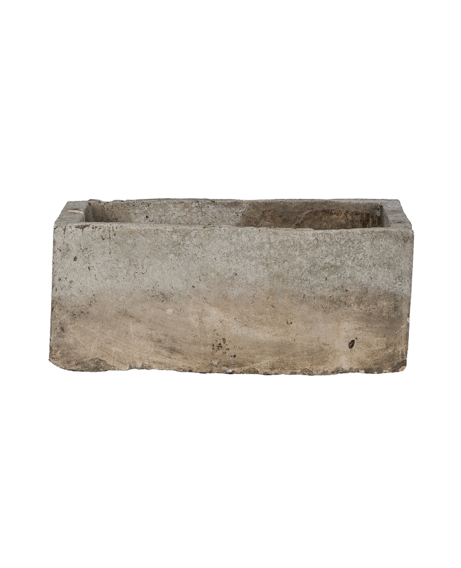 Vintage Indonesian rectangular limestone trough showing weathered exterior texture.