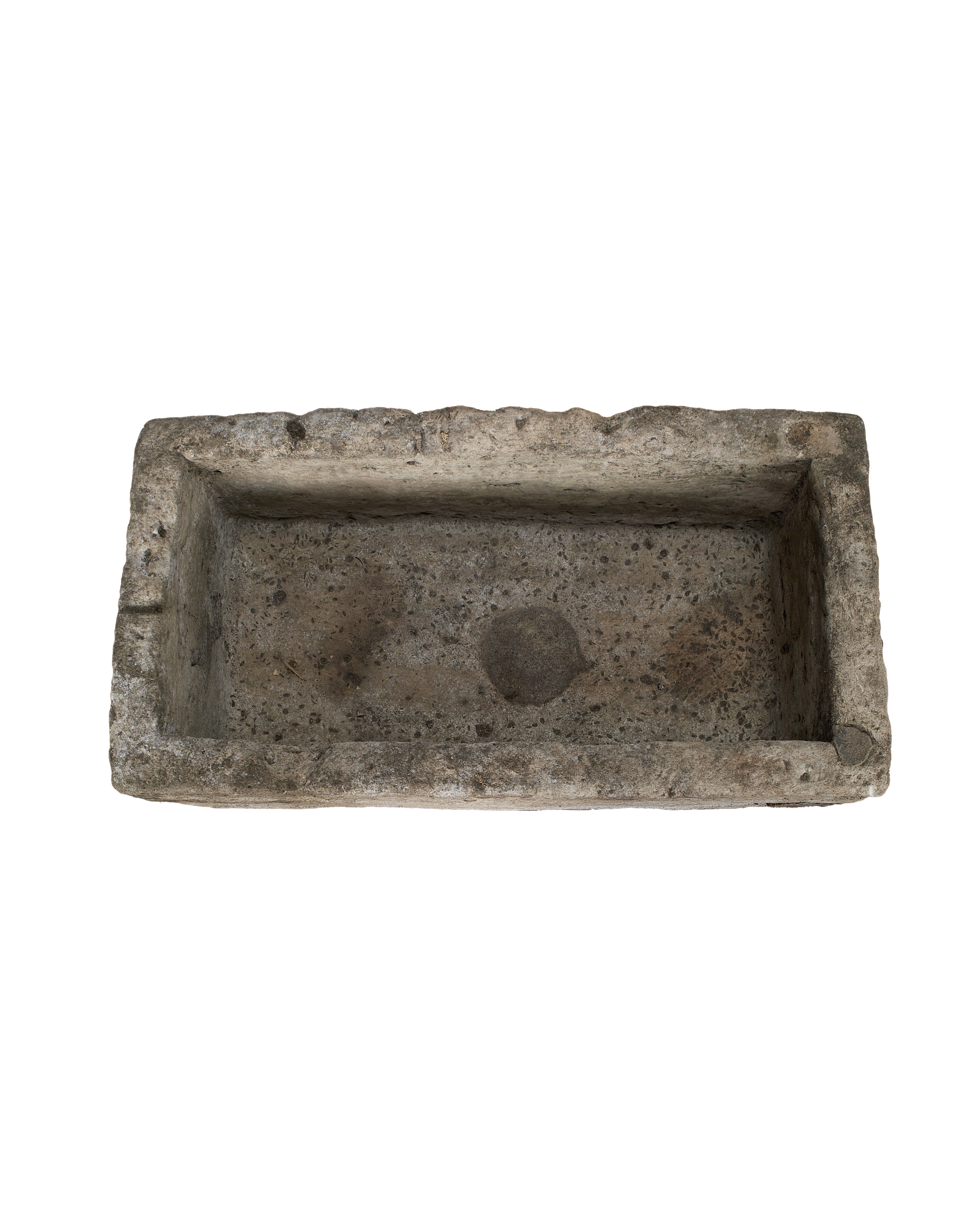 Vintage rectangular Indonesian limestone trough, top-down view showing interior texture and weathered surface.