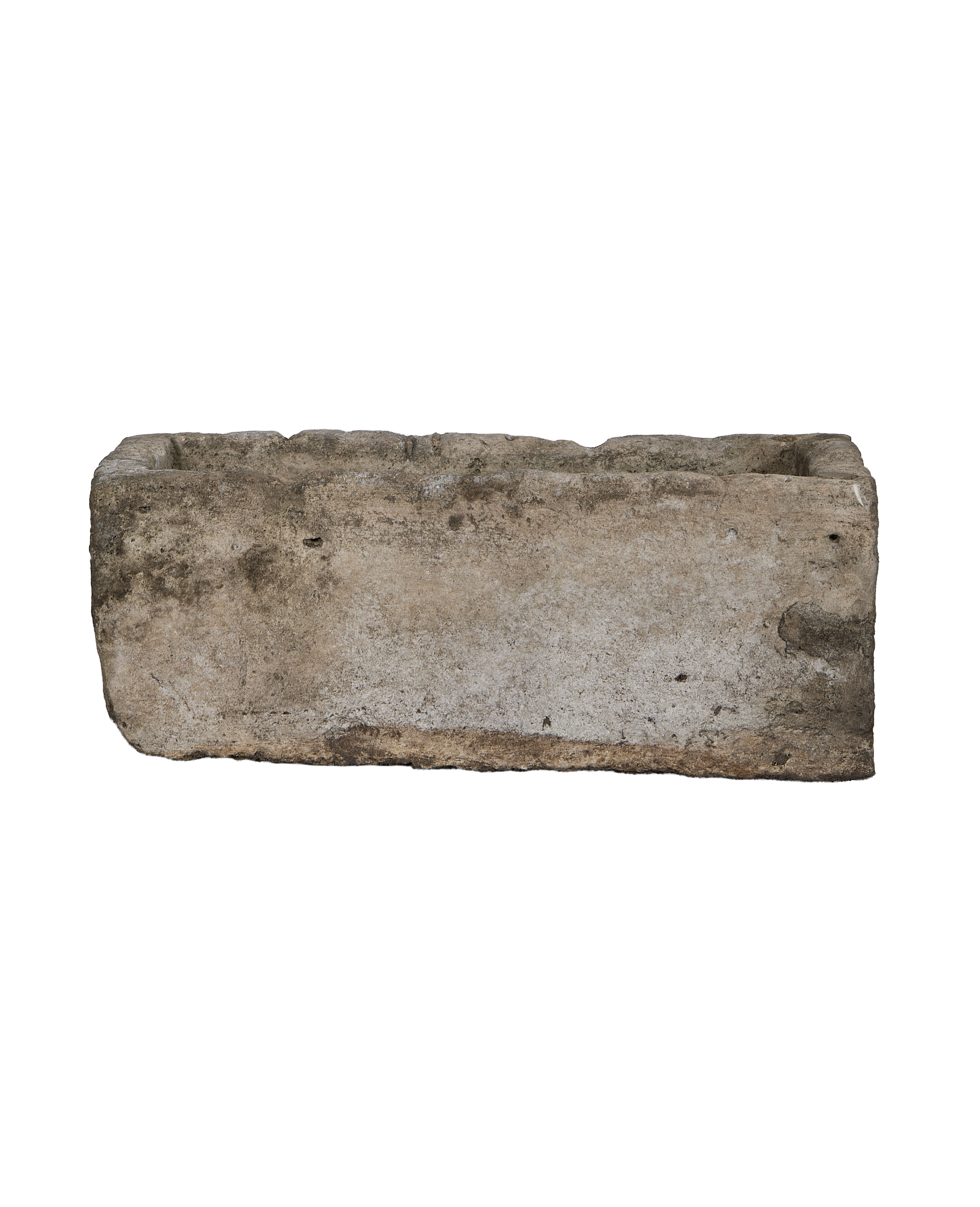 Vintage Indonesian rectangular limestone trough, light gray with weathered marks, isolated, front view.