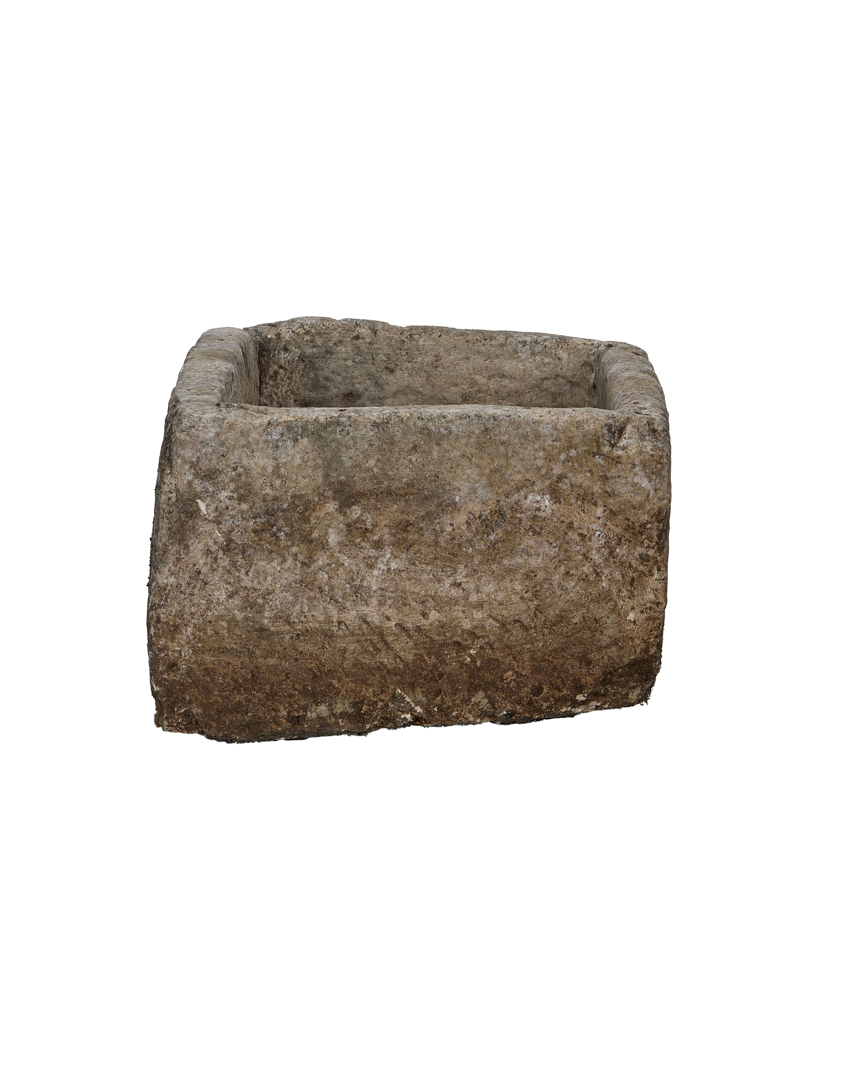 Vintage Indonesian limestone rectangular trough, showing exterior texture and weathered surface from a side angle.