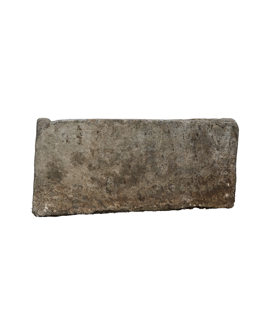 Vintage Indonesian rectangular limestone trough, close-up texture detail and weathered patina.