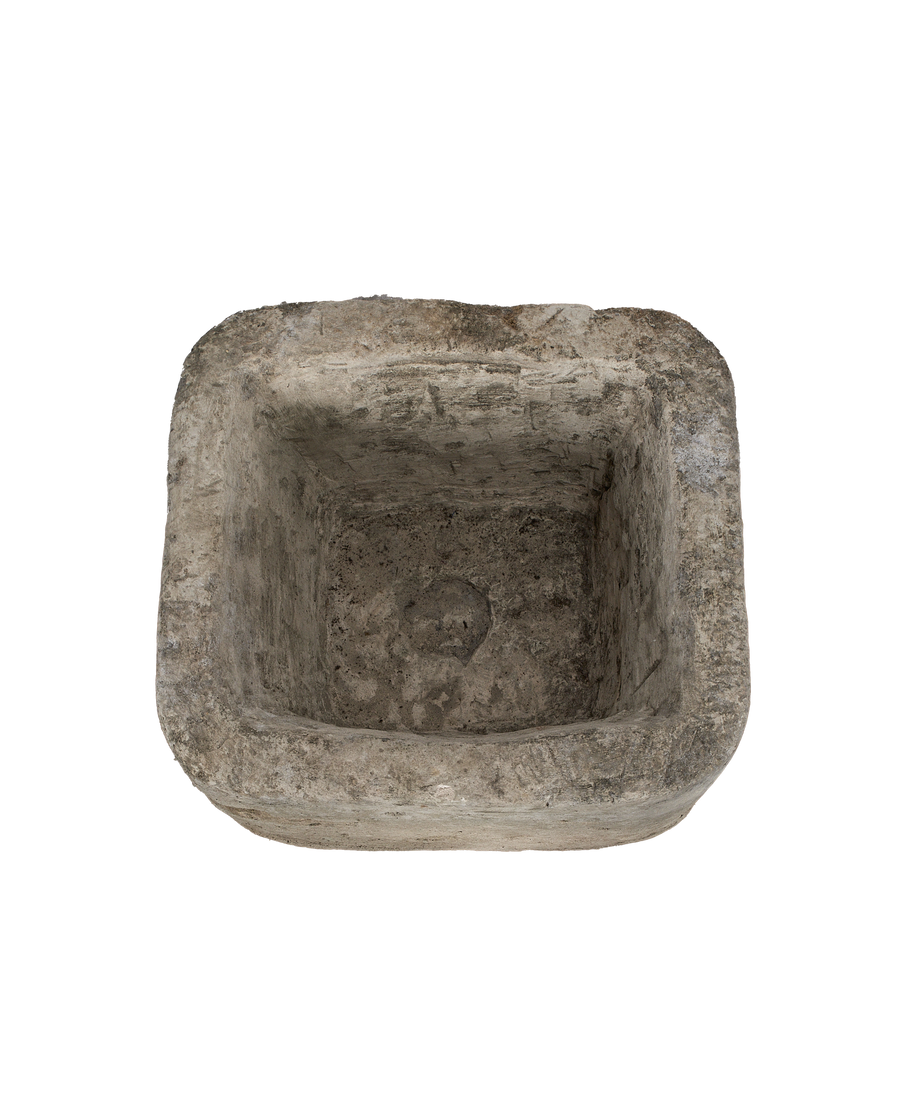Vintage rectangular Indonesian limestone trough, top view highlighting rough, weathered texture and interior.