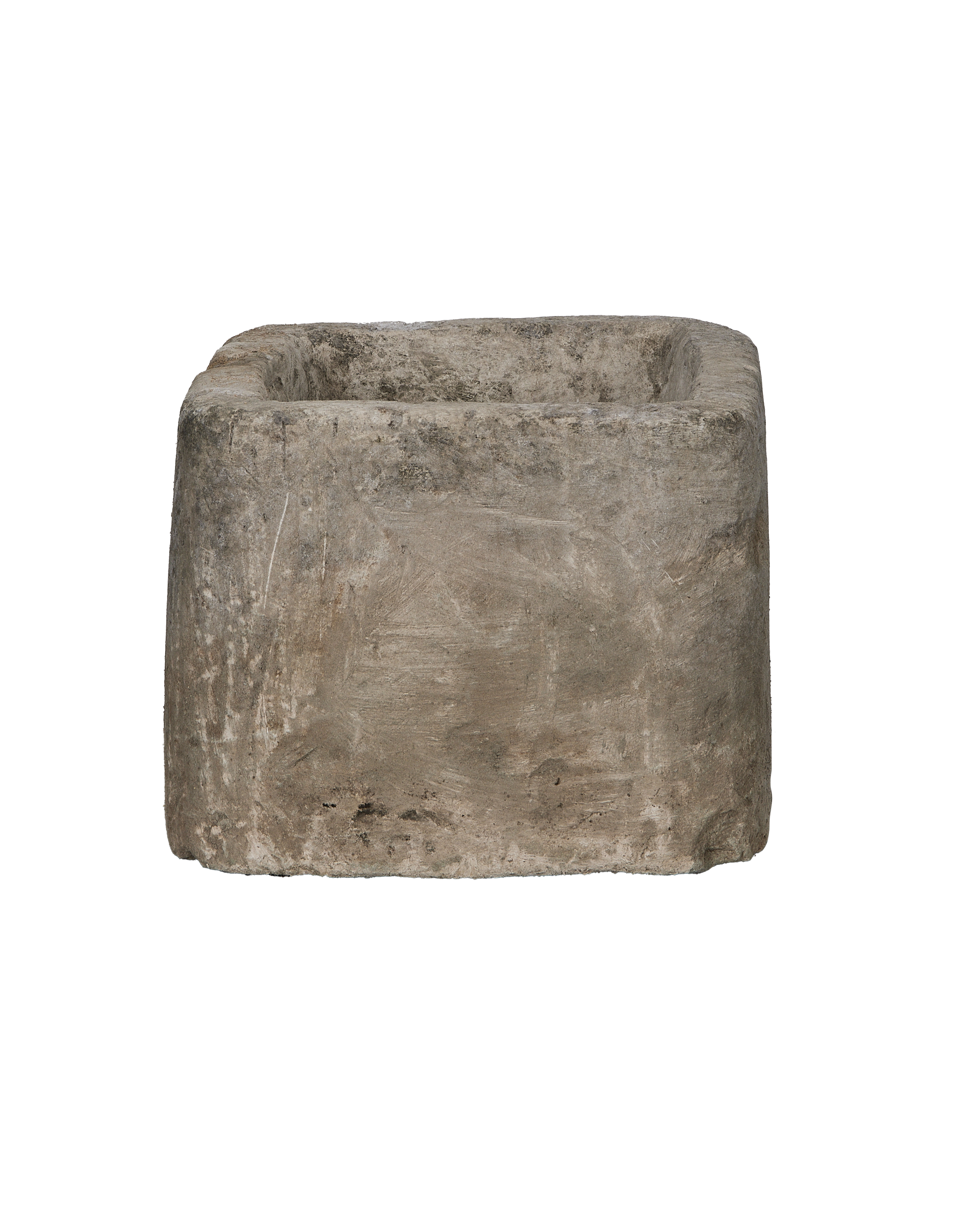 Vintage Indonesian limestone trough, rectangle shape, showing textured sideview and worn edges.