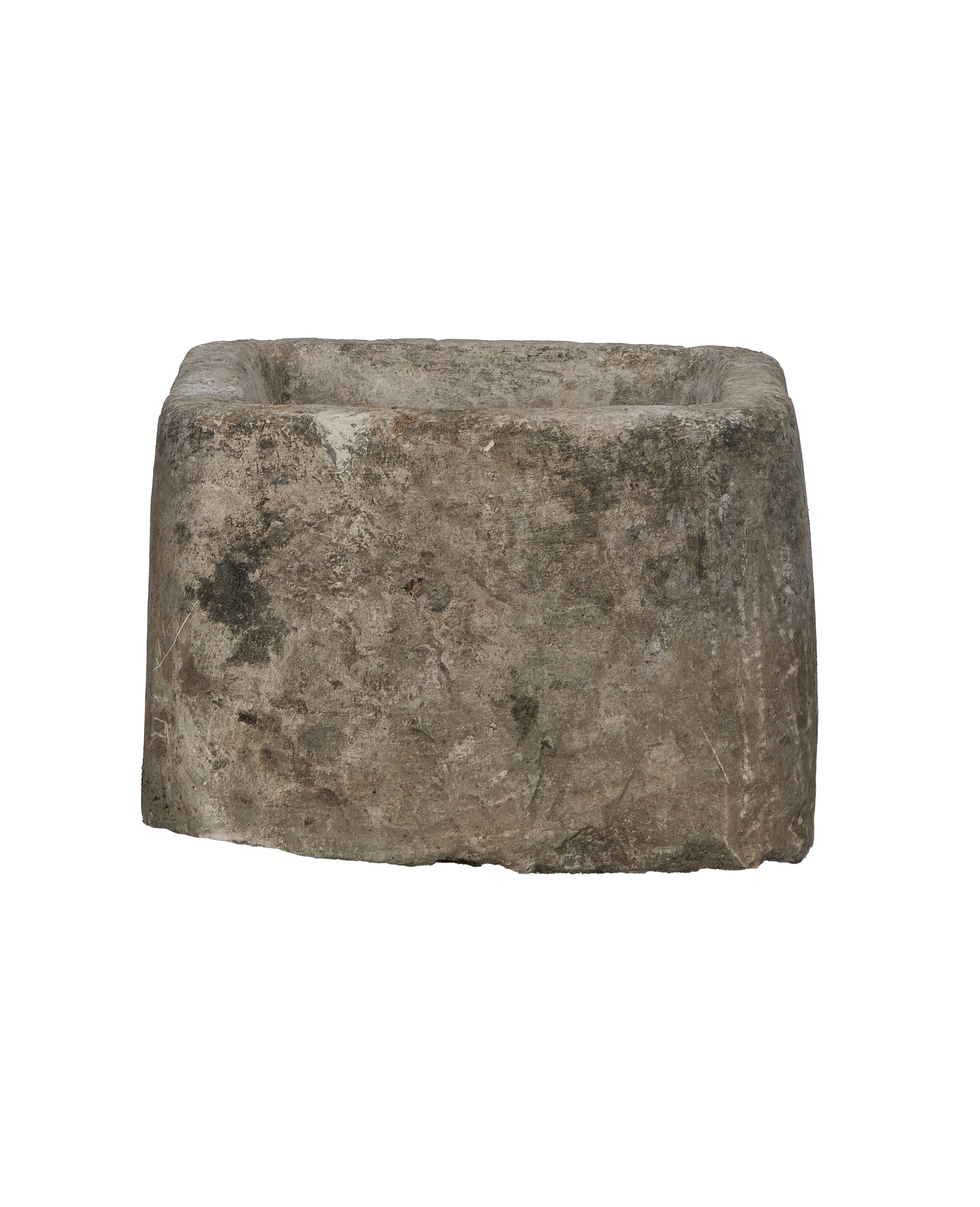 Vintage Indonesian rectangular limestone trough, close-up of rough, weathered texture and imperfections.