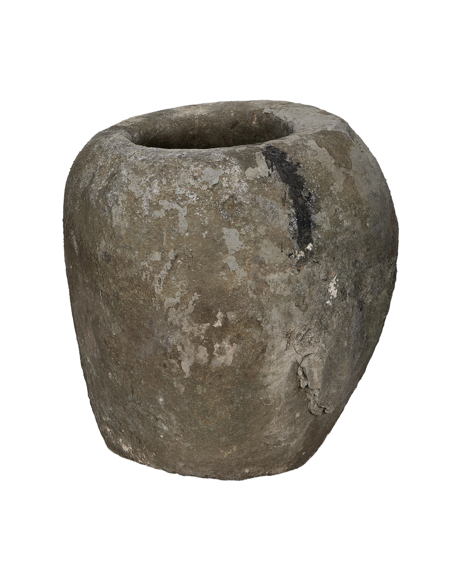 Vintage Indonesian limestone trough, partially visible opening from an elevated, angled view.