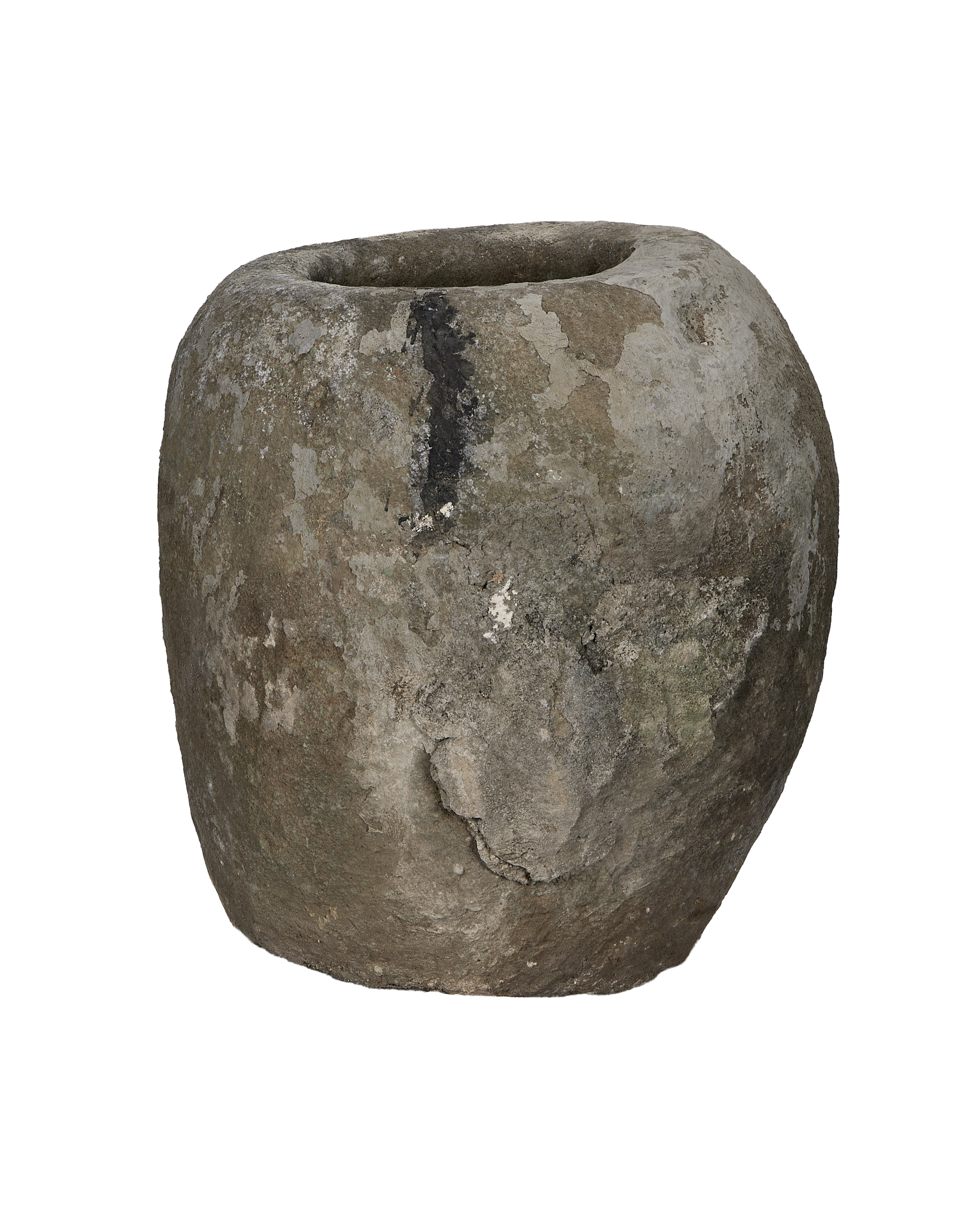 Vintage Indonesian limestone trough, round, showing weathered gray-black surface texture detail.