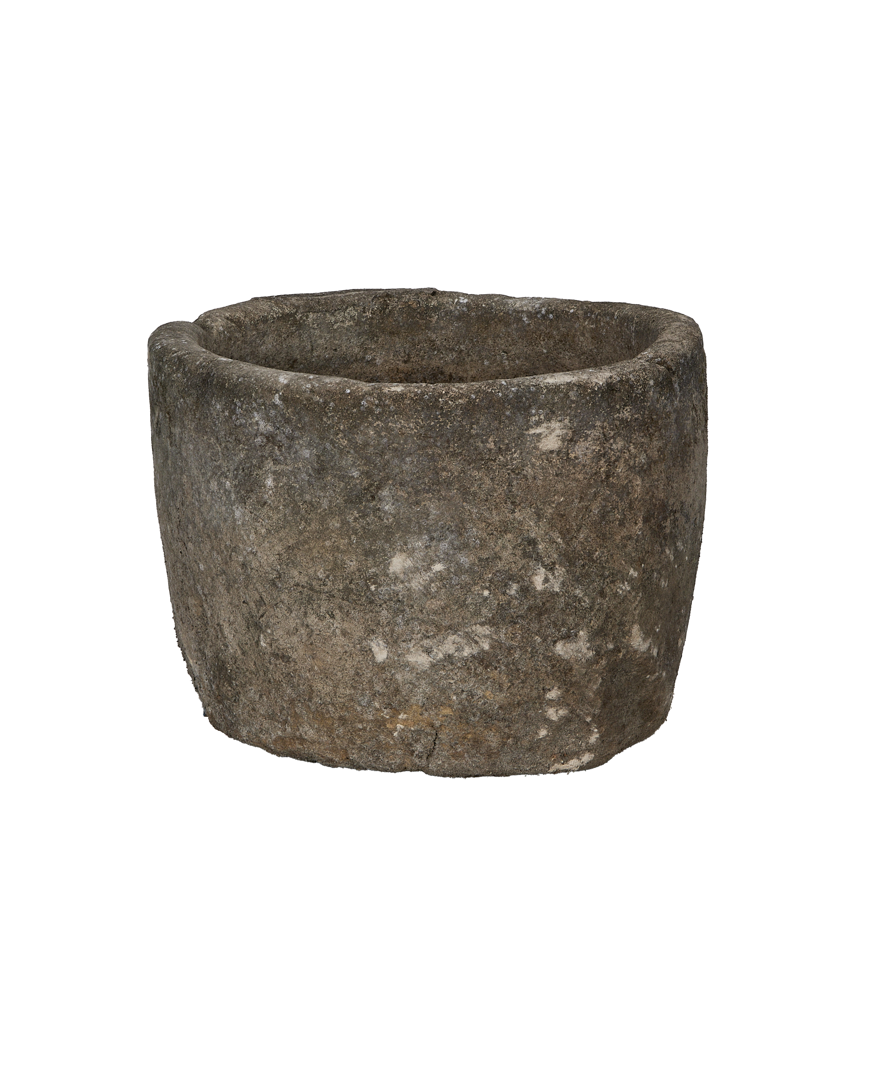 Vintage Indonesian round limestone trough, showing weathered texture, unique side angle.