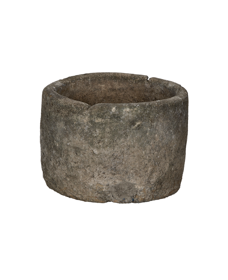 Vintage round Indonesian limestone trough, OAK construction, showing interior texture and aged patina.