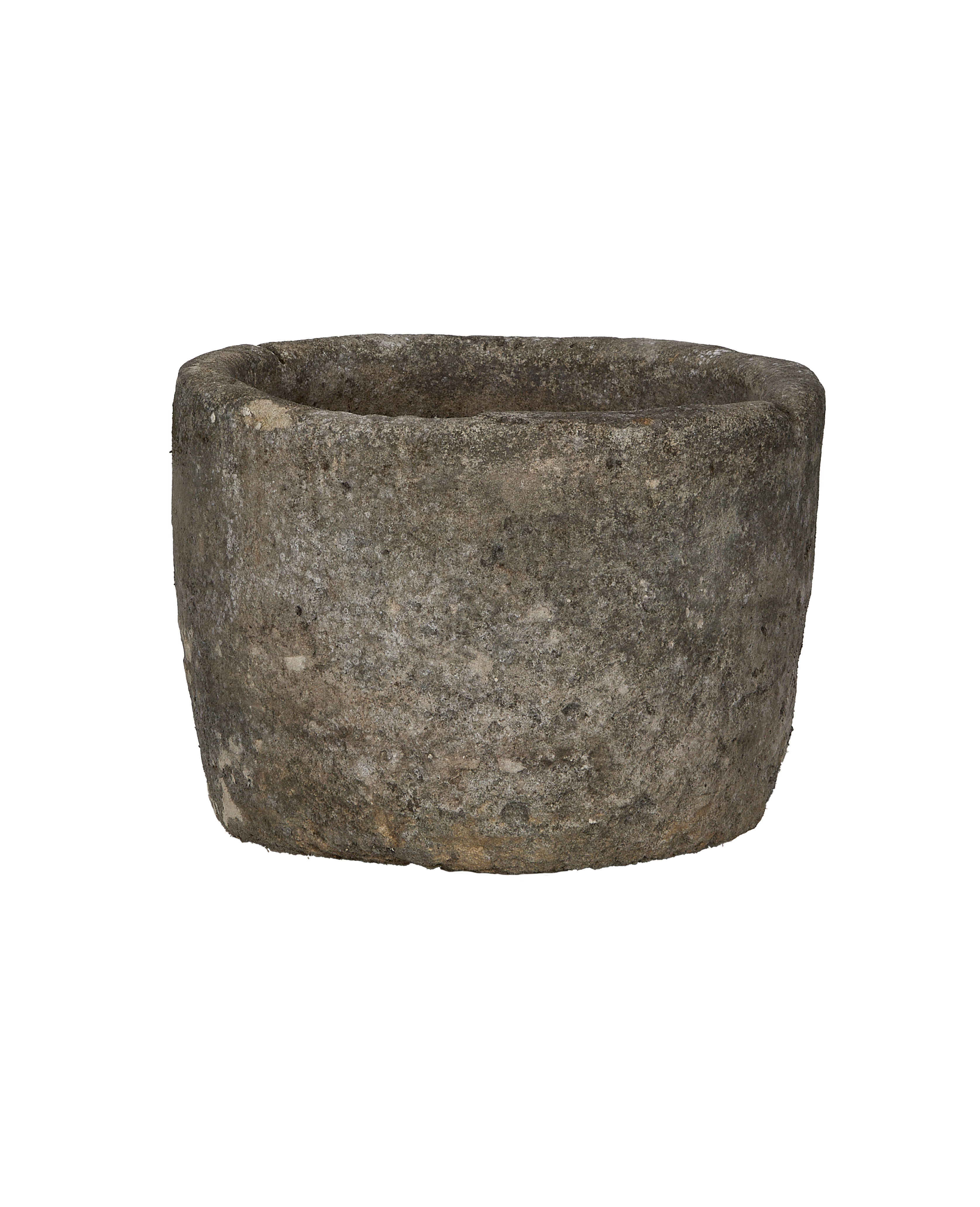 Vintage Indonesian round limestone trough, close-up of textured surface and rim, good condition.