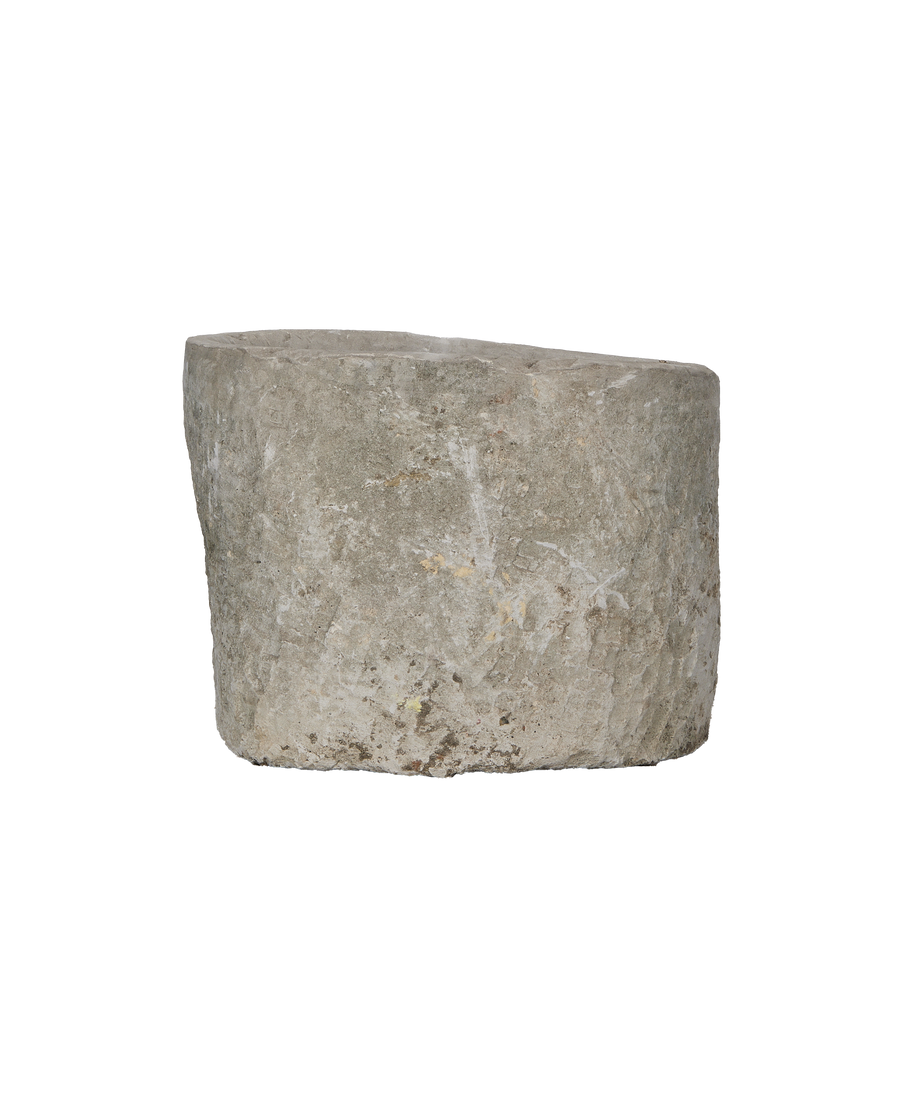 Vintage Indonesian limestone trough, showing weathered side texture with natural imperfections.