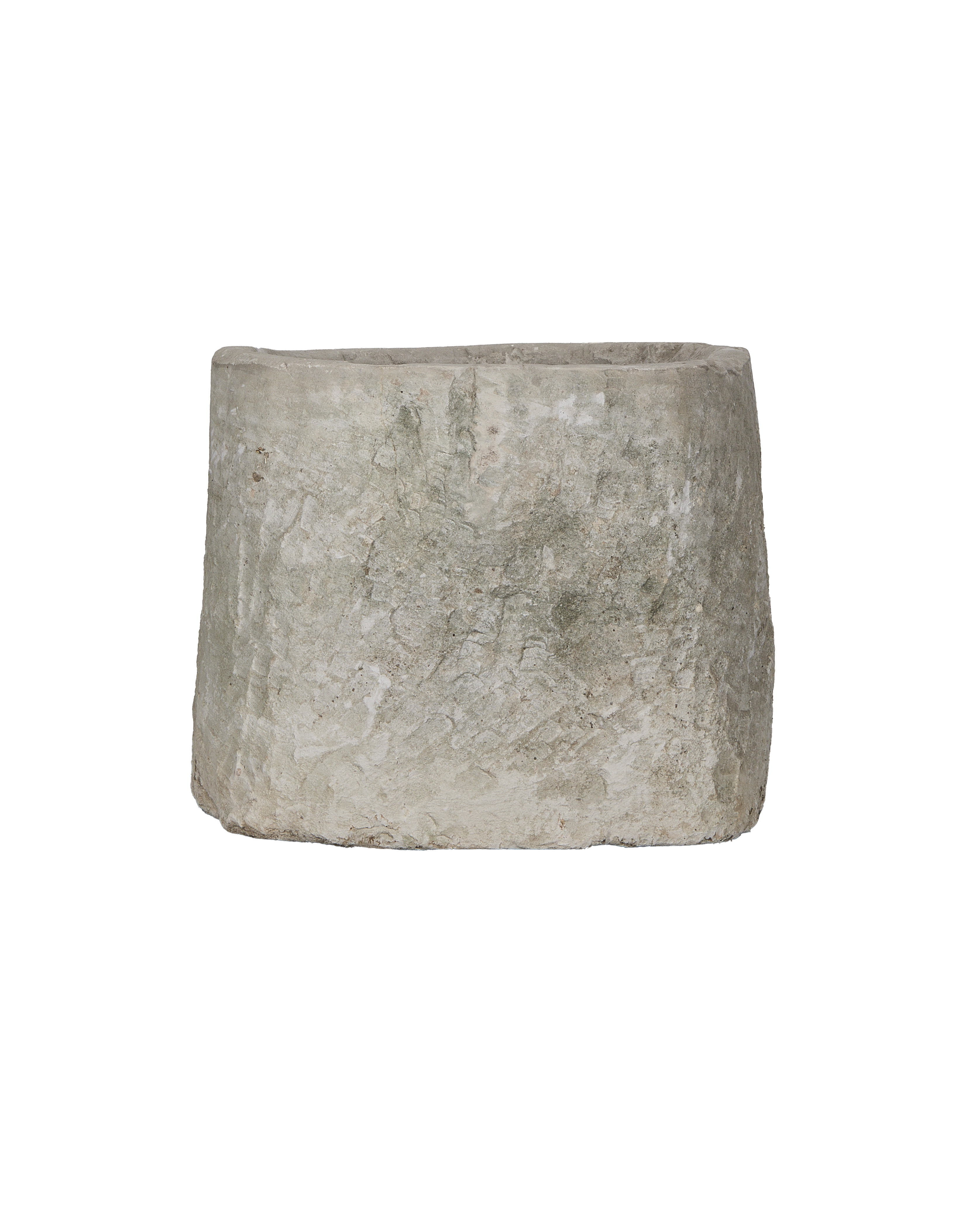 Vintage Indonesian round limestone trough, showing a side view of its rustic, textured surface.