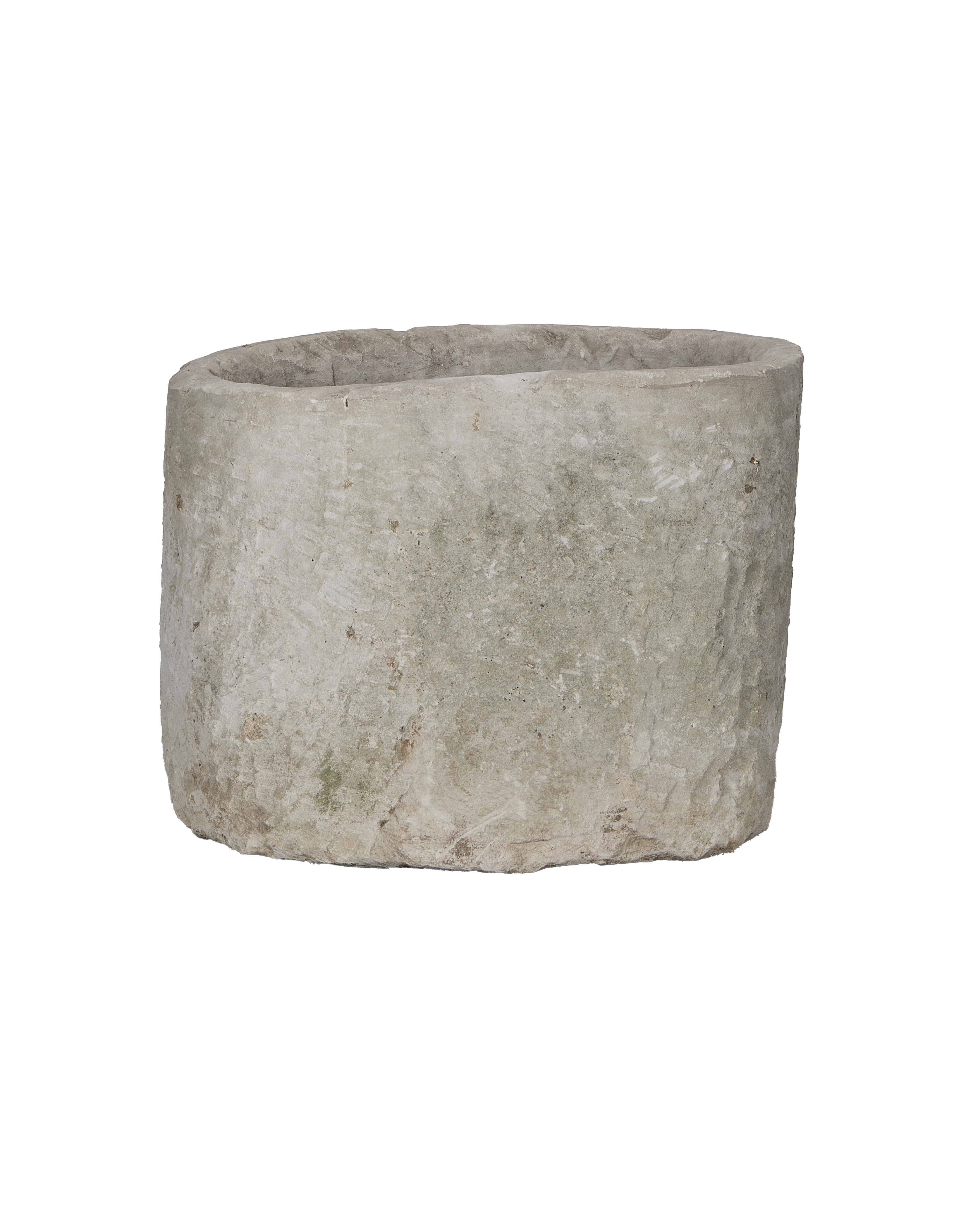 Vintage Indonesian round limestone trough, showing weathered texture from slightly elevated angle.