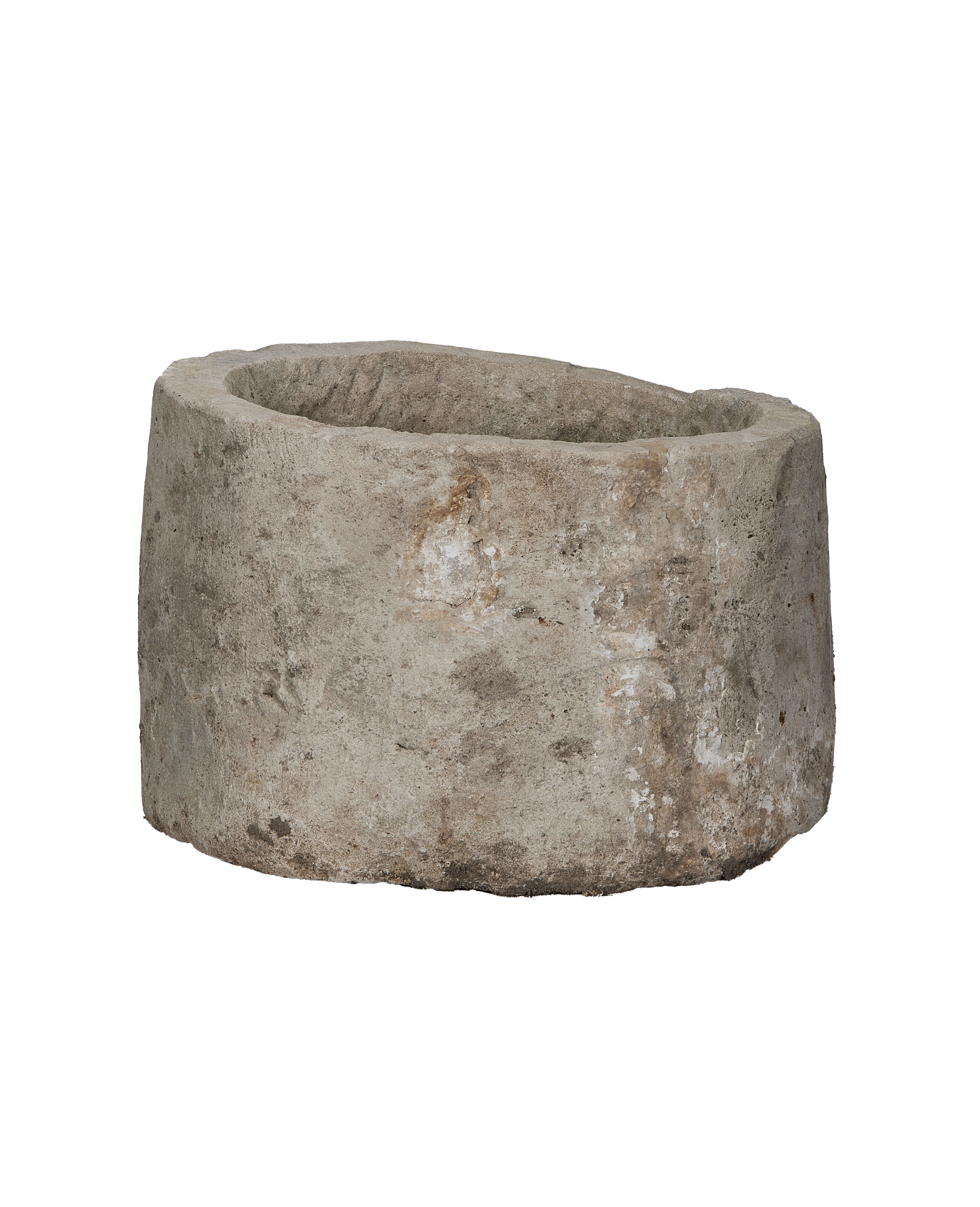 Vintage Indonesian round limestone trough, side view, showcasing weathered texture and unique organic rim.