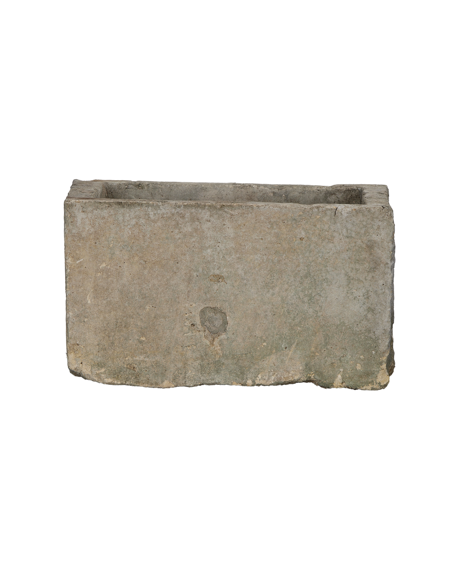 Vintage Indonesian rectangular limestone trough showing rough-hewn texture and natural weathered patina.