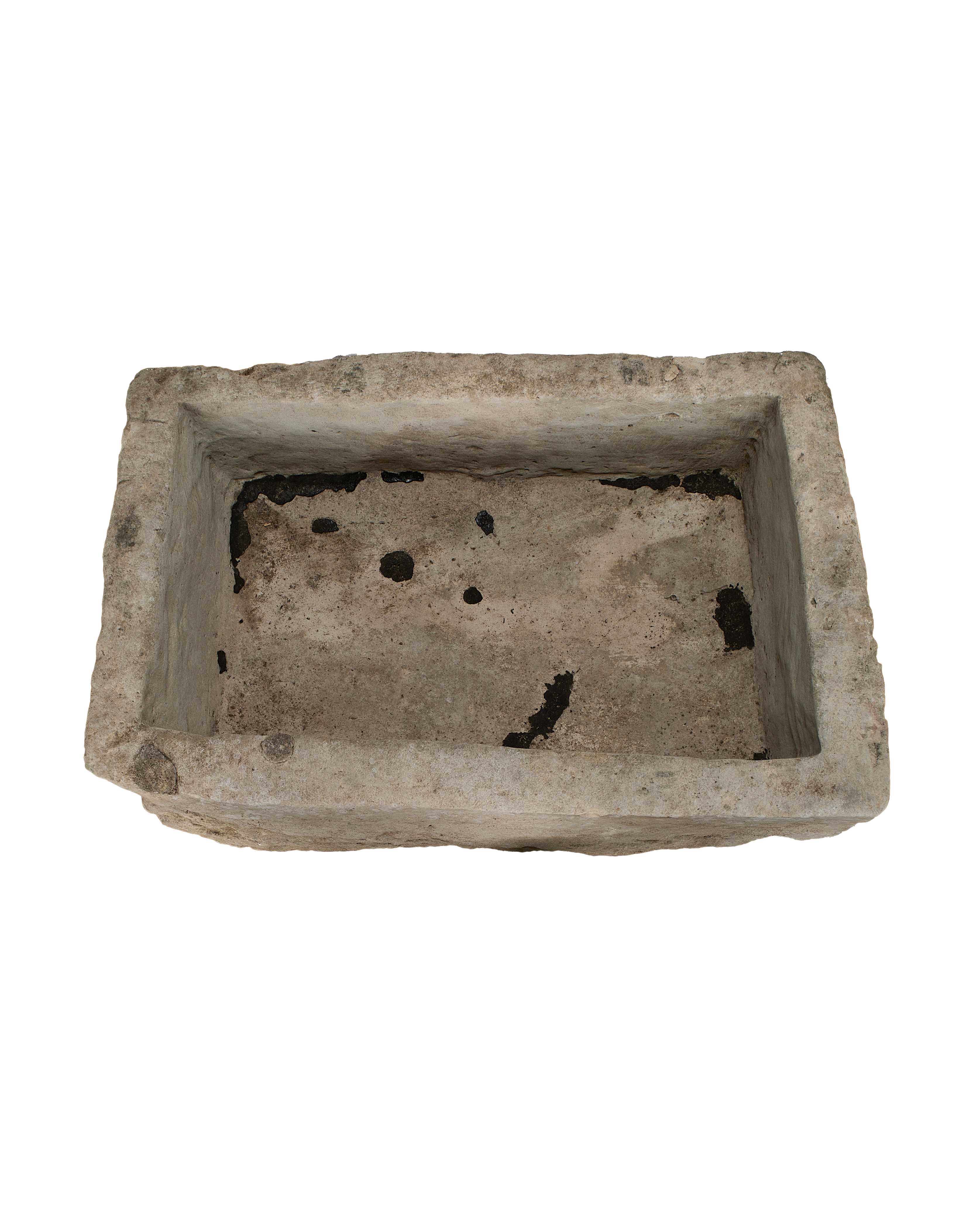 Rectangular vintage Indonesian limestone trough, top view showing weathered interior with dark patina.