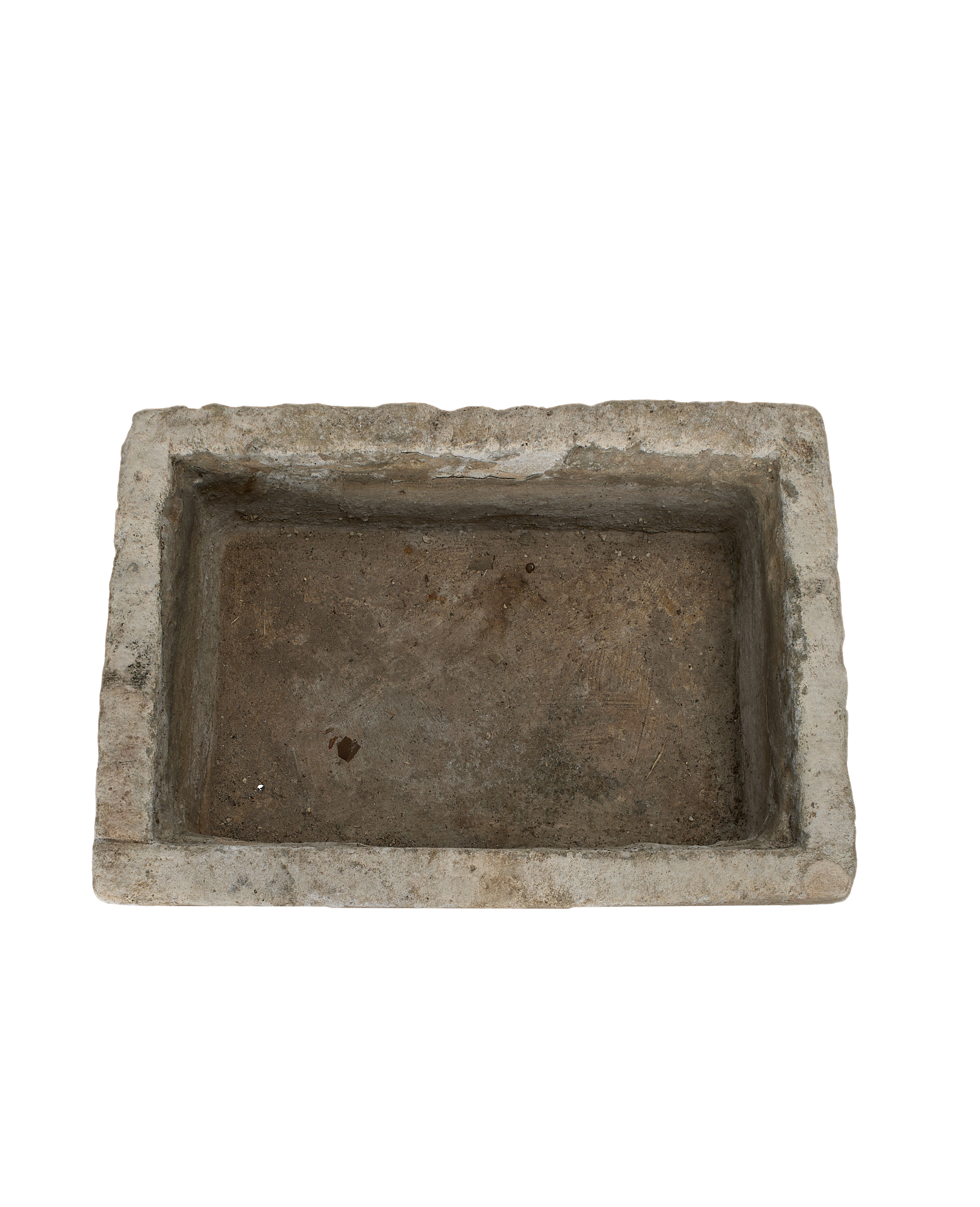Vintage rectangular Indonesian limestone trough, top-down view showing interior texture and aged surface.