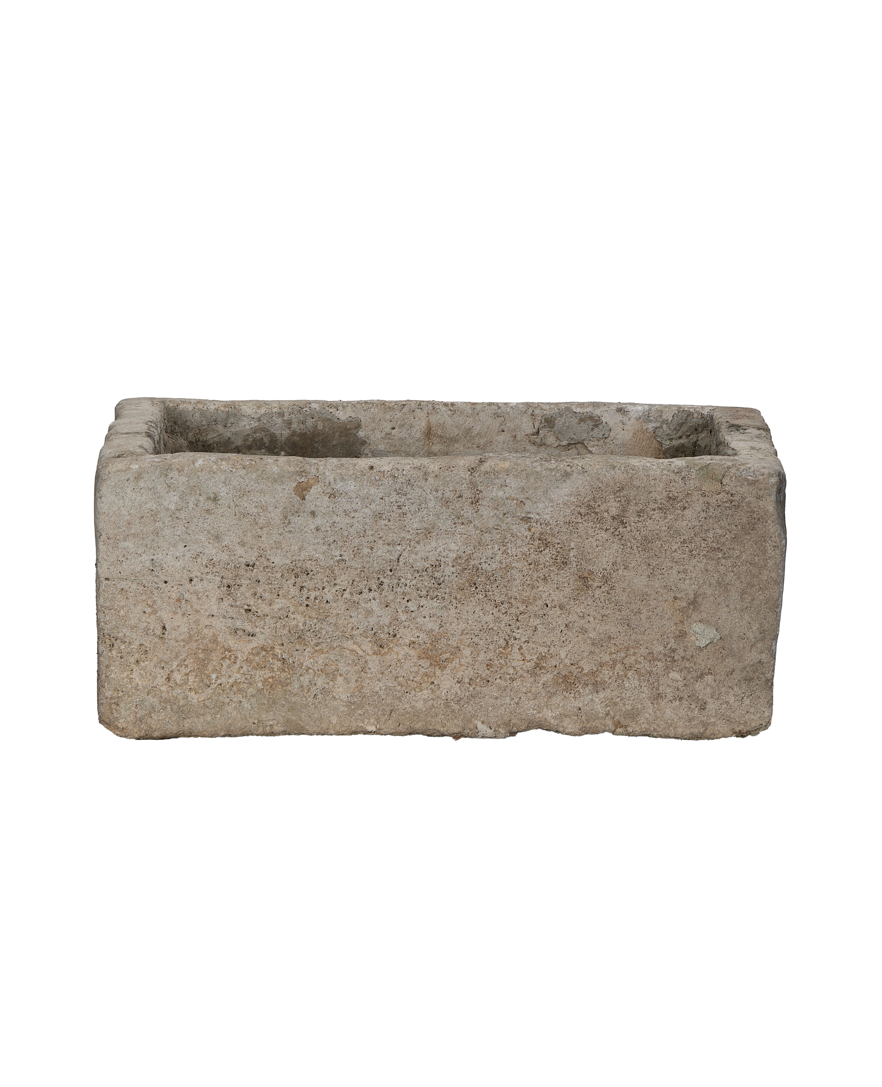 Vintage Indonesian limestone rectangular trough, showing textured side and aged, worn rim details.