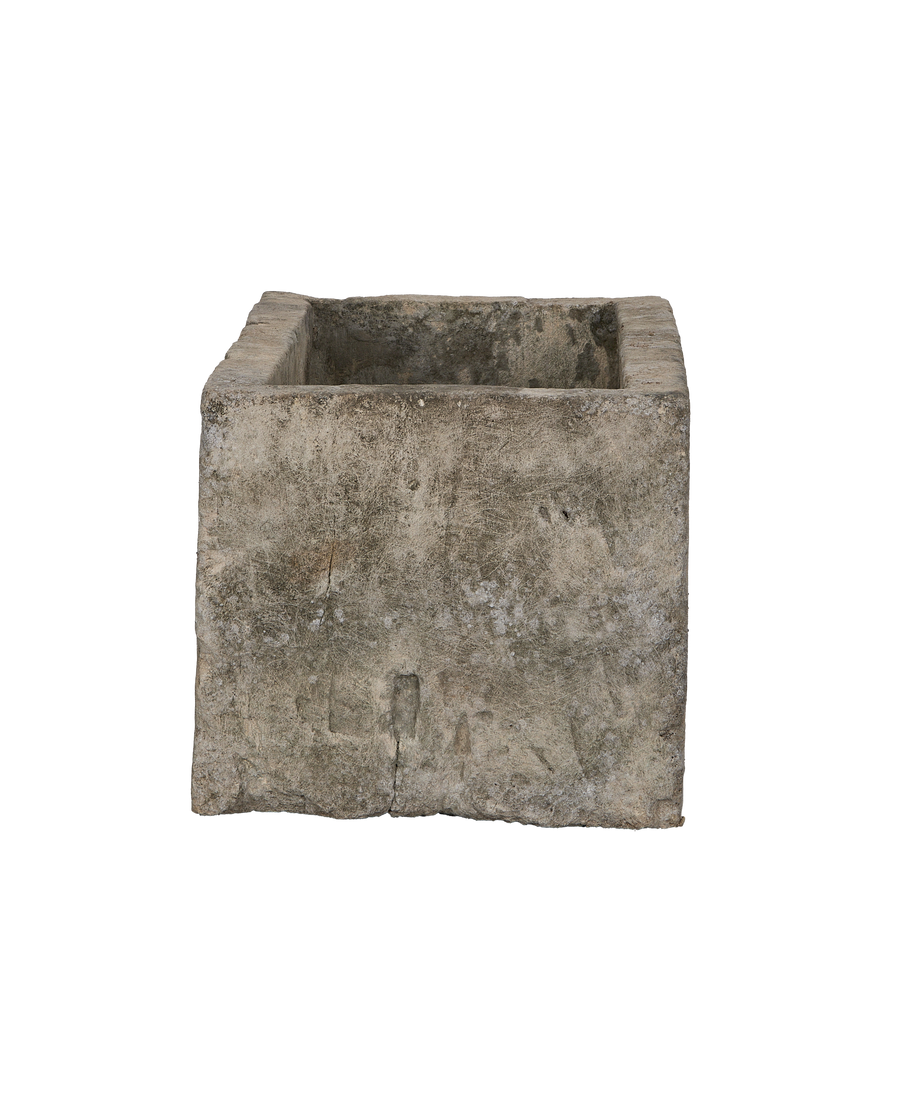 Vintage Indonesian rectangular limestone trough showing weathered, textured exterior.