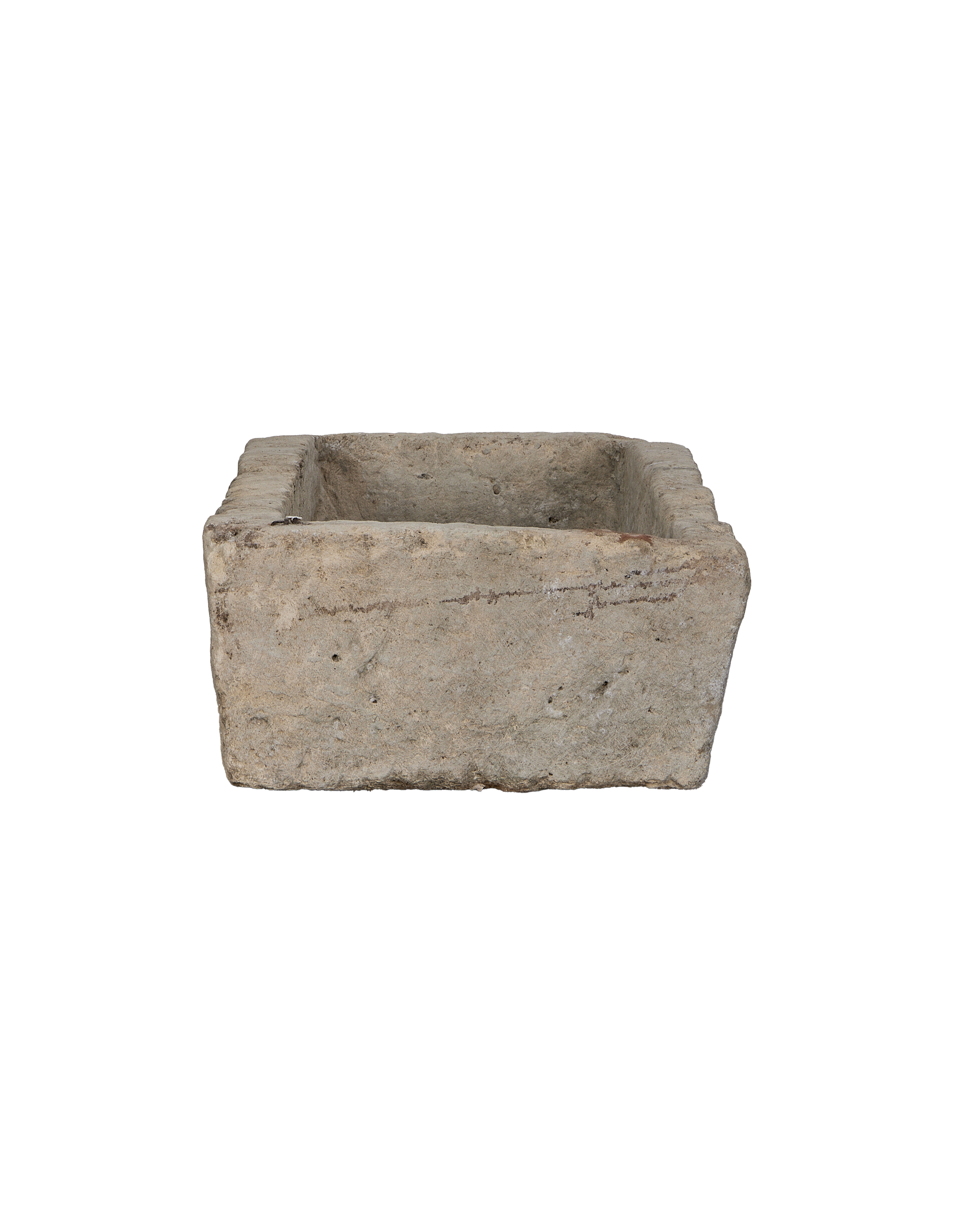 Vintage rectangular limestone trough, showing the rustic texture and weathered interior from above.