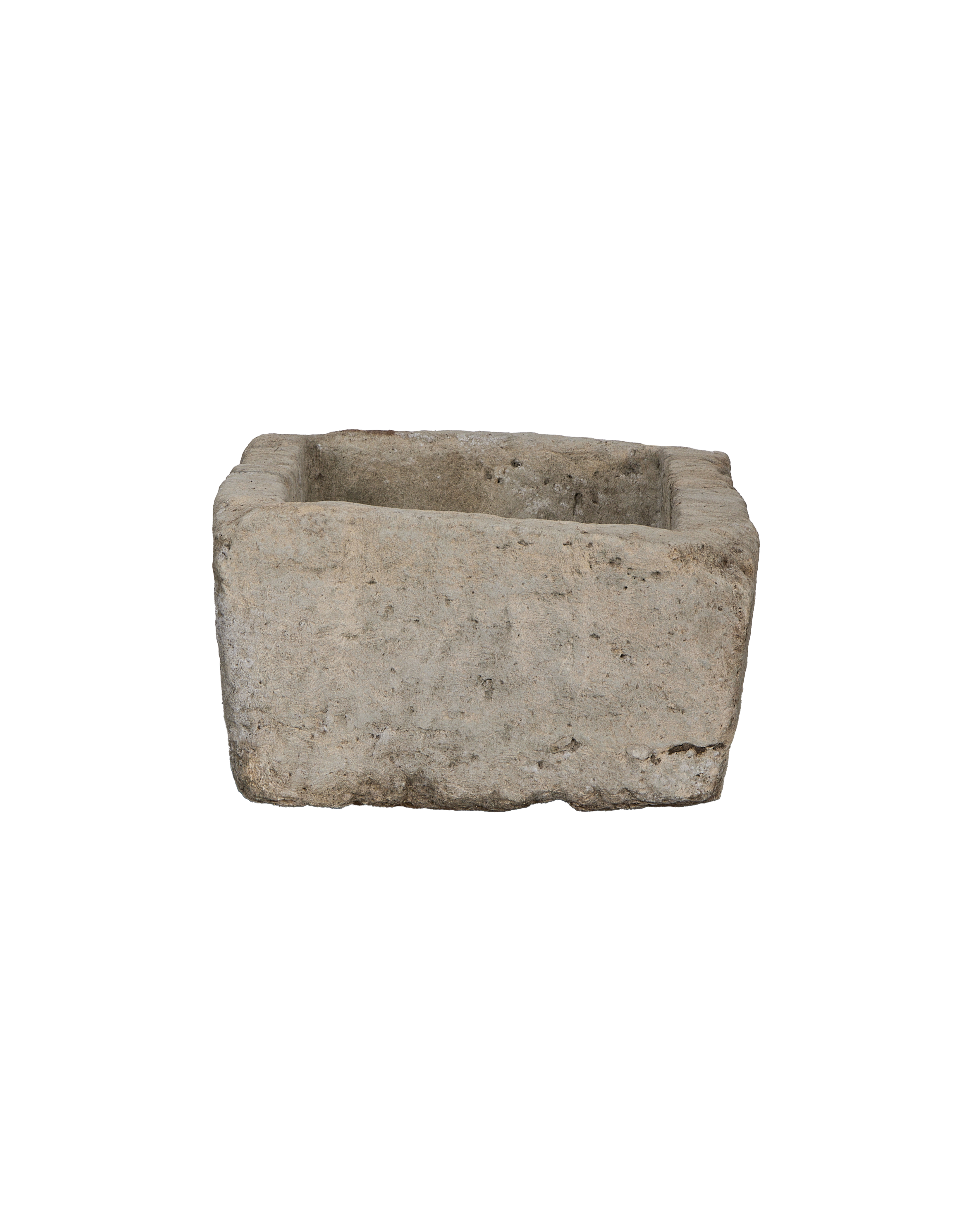 Vintage Indonesian limestone trough, showing rough textured exterior and distinct rectangular shape.