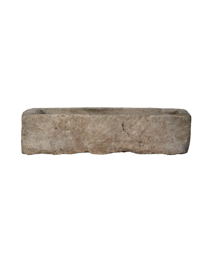 Vintage Indonesian rectangular limestone trough, front view highlighting rough, weathered texture and natural imperfections.
