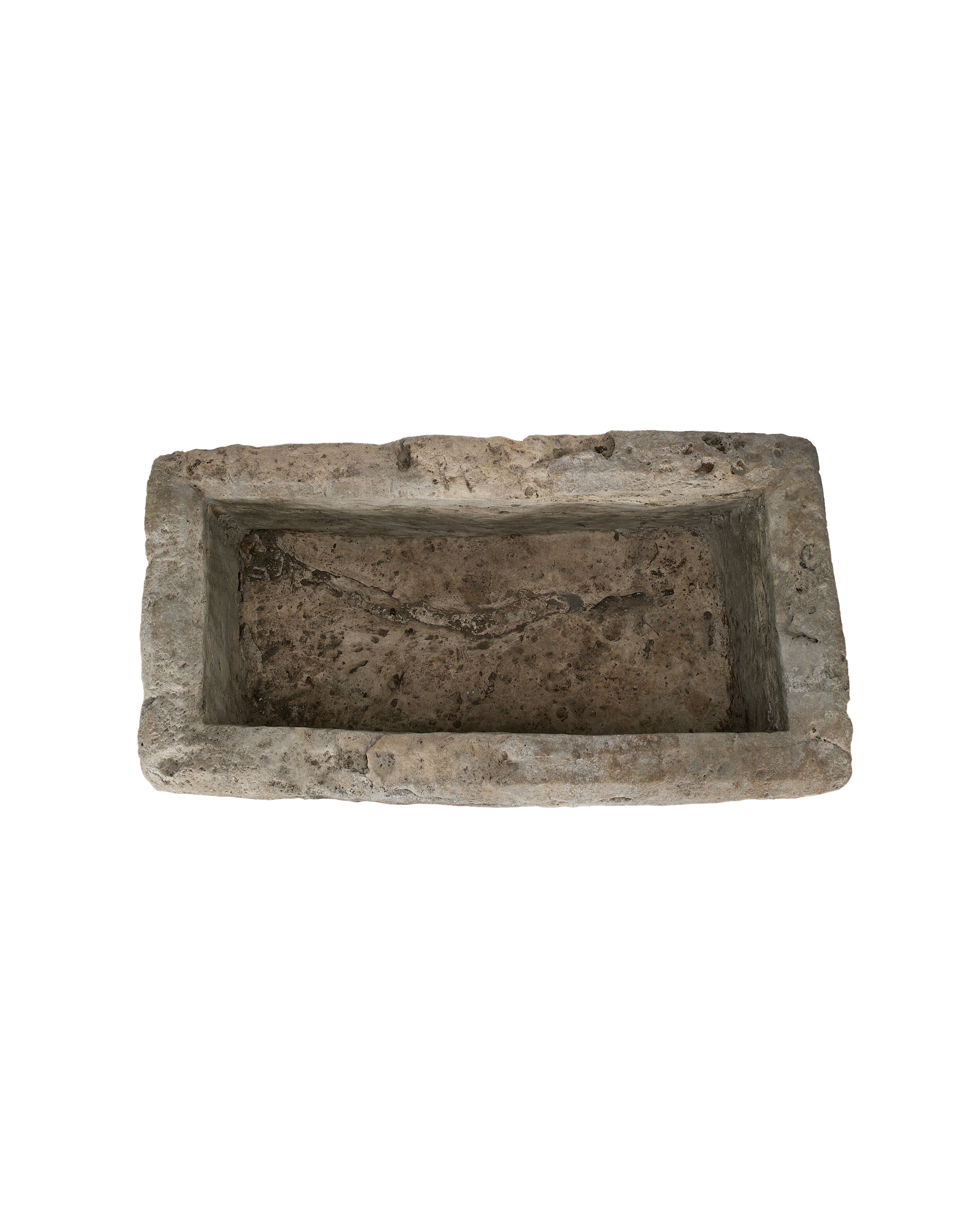 Vintage Indonesian rectangular limestone trough, detailed view of rough, weathered interior texture.