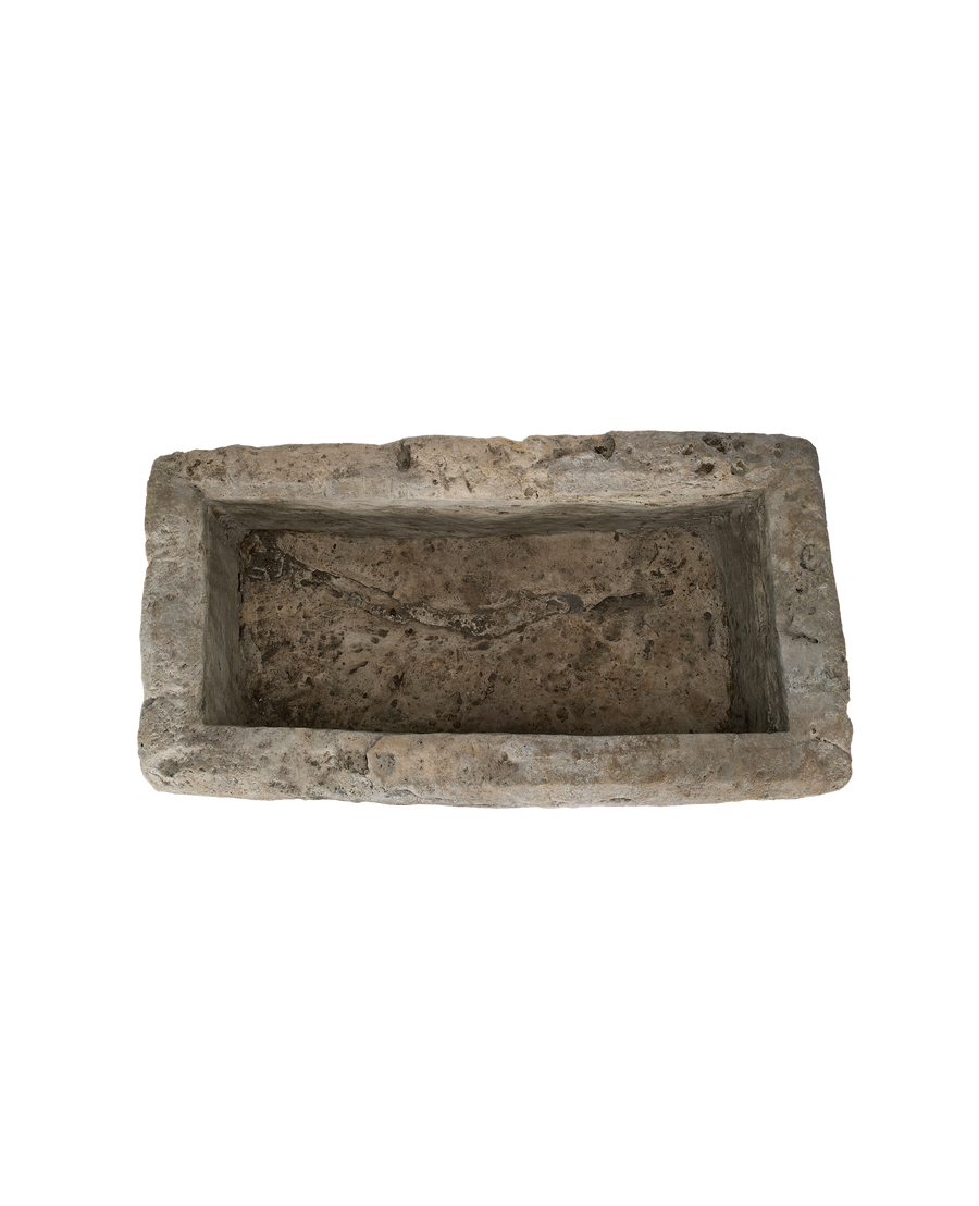 Vintage Indonesian rectangular limestone trough, detailed view of rough, weathered interior texture.