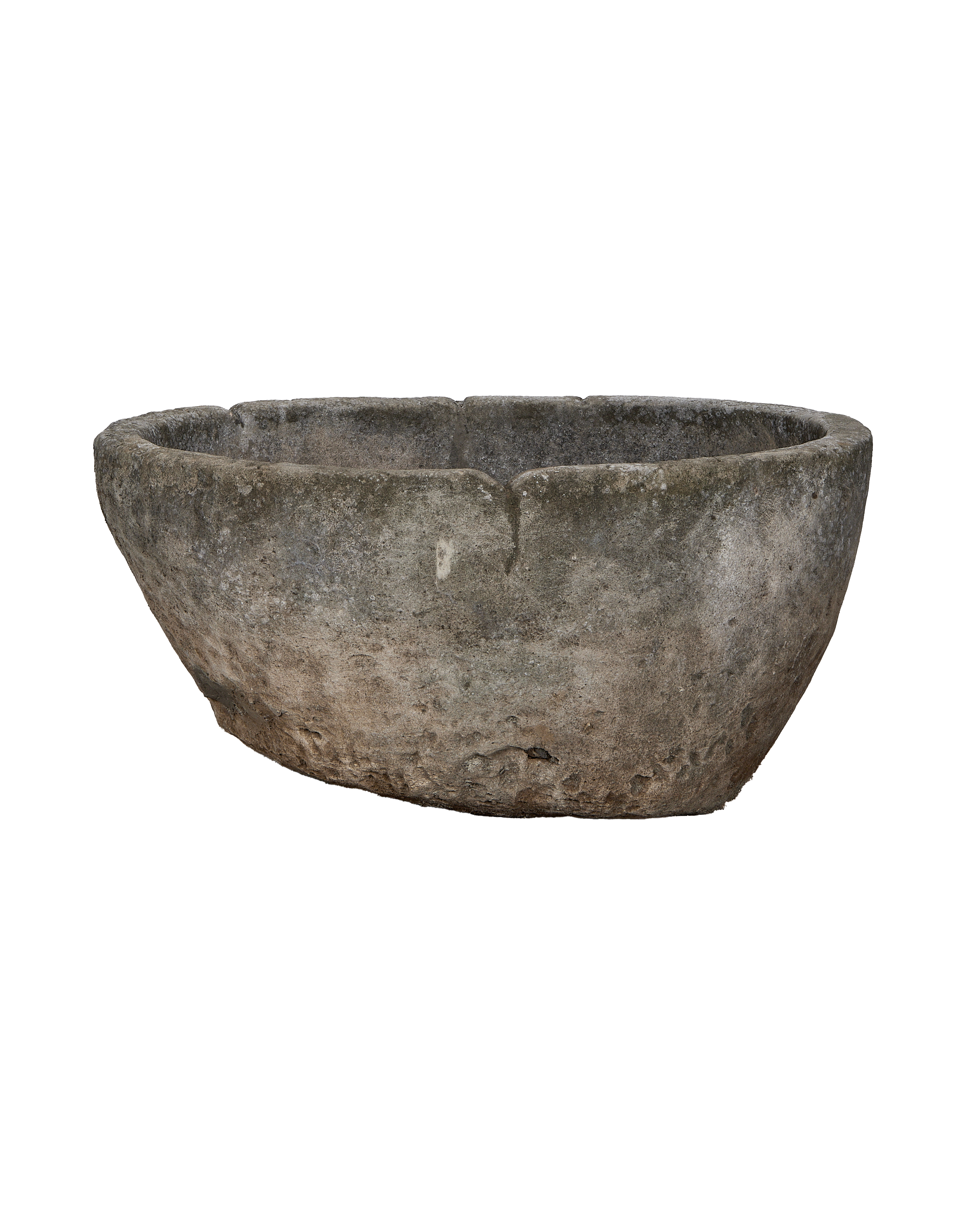 Vintage Indonesian round limestone trough, showing surface texture and rim detail.