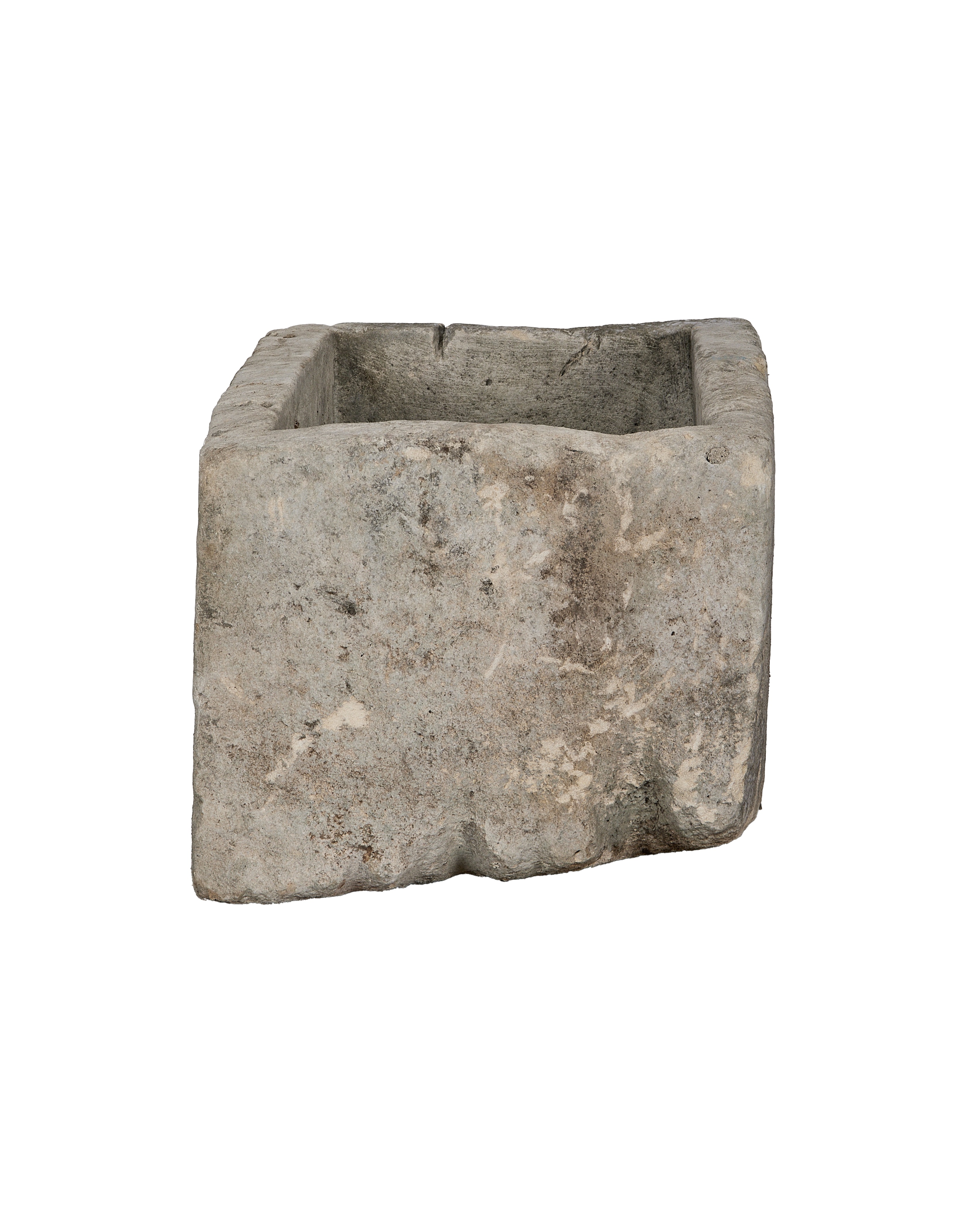 Vintage Indonesian limestone trough, OAK, showing rough weathered texture, side view.