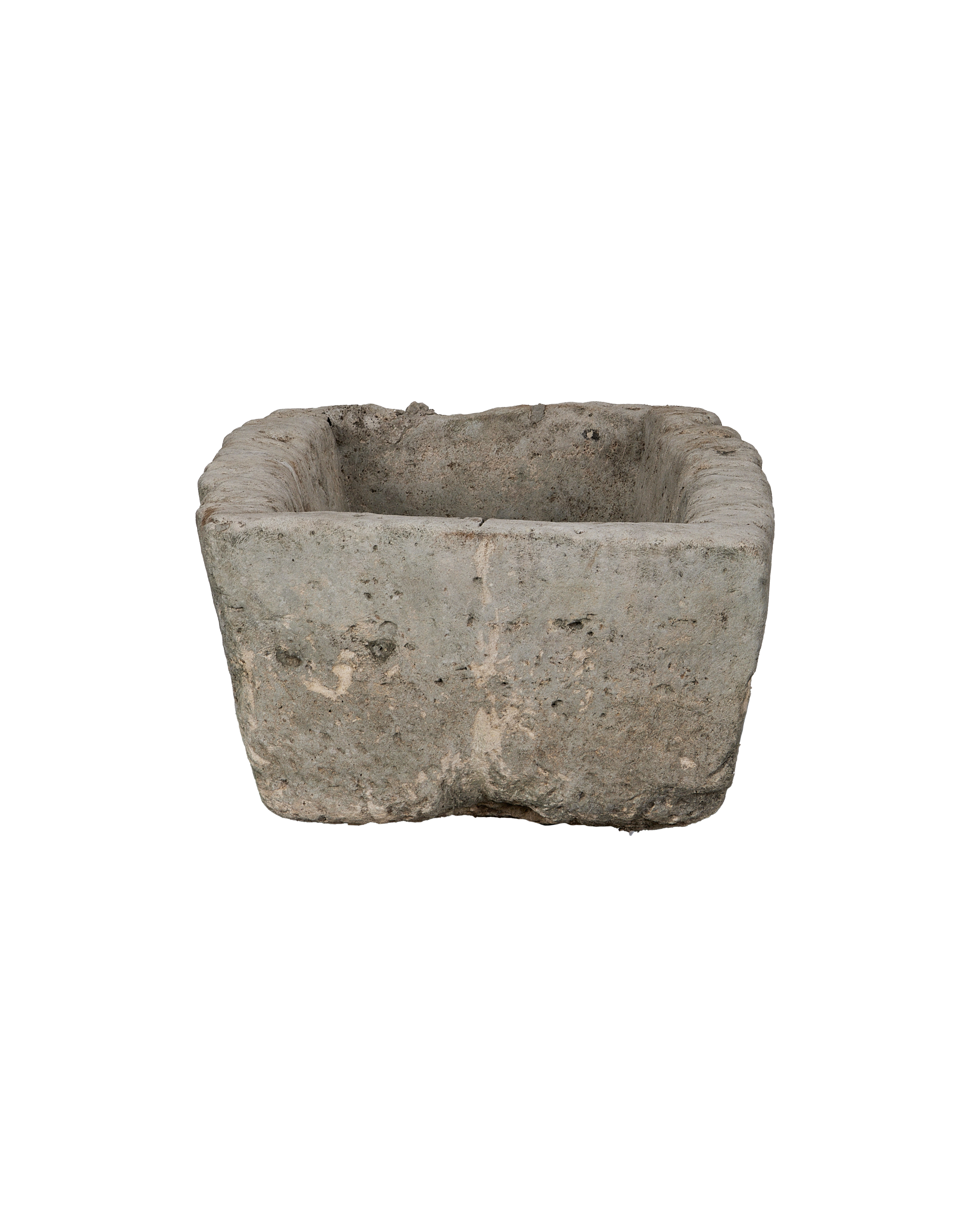 Vintage Indonesian OAK limestone trough, showing weathered texture and rectangular shape from an elevated angle.