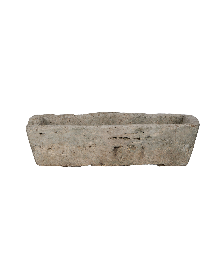 Distressed vintage limestone trough, rectangular, showing textural wear, perfect for garden accents.