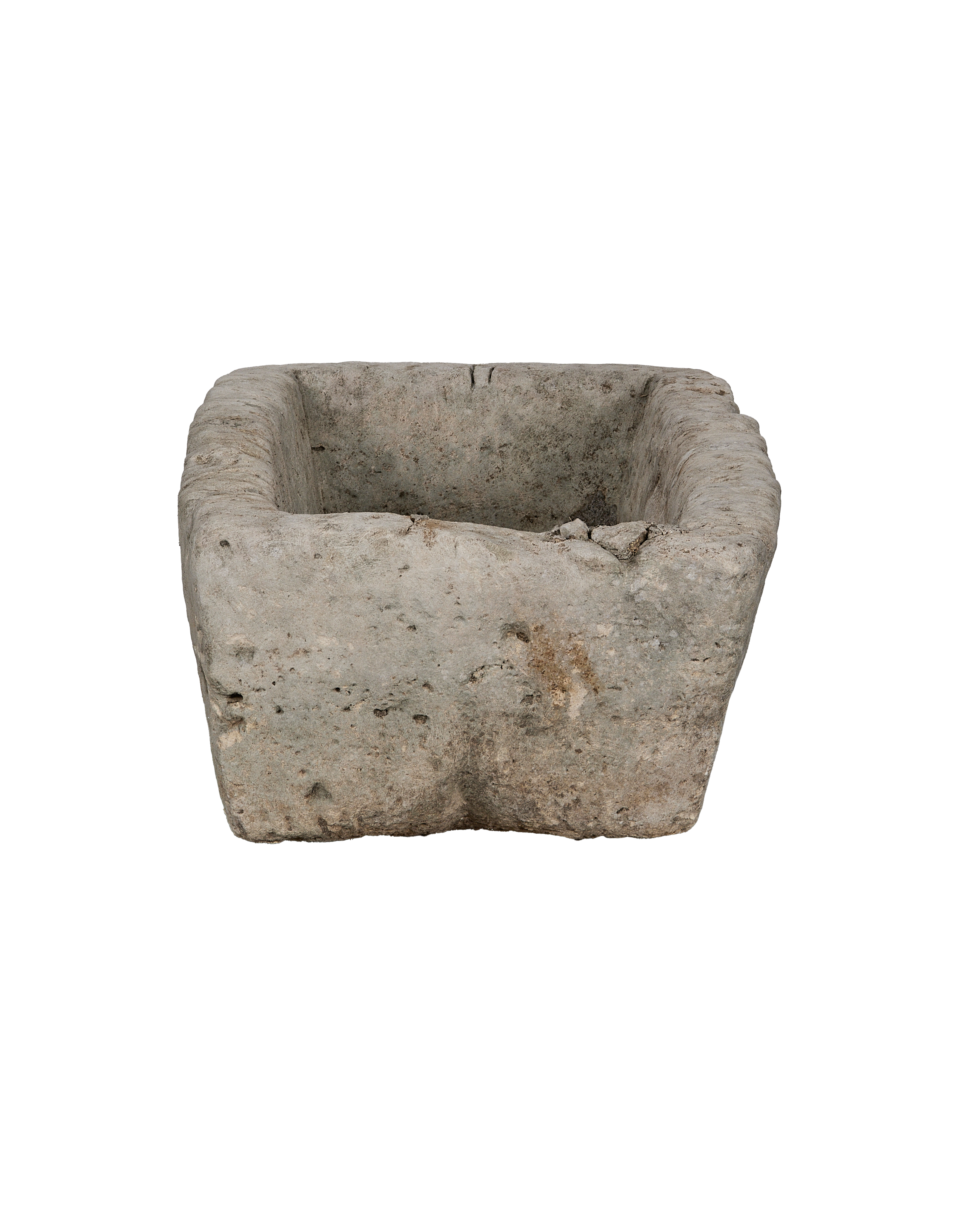 Vintage Indonesian limestone trough top-down angle, showing interior detail and rough texture.