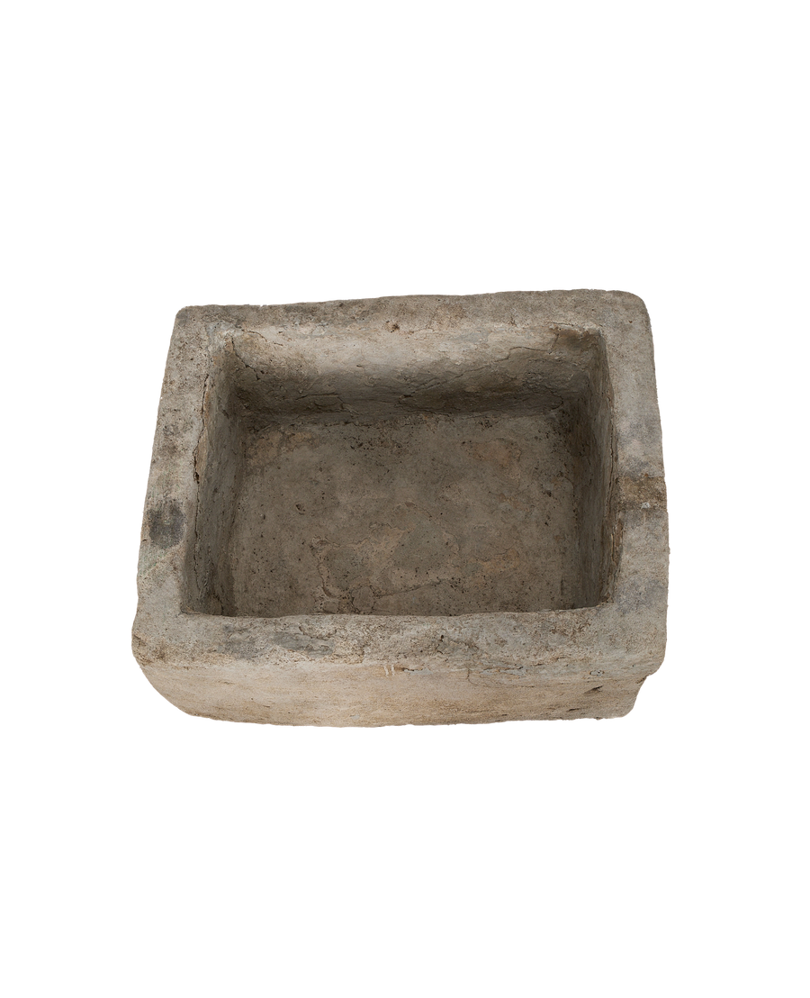 Vintage Indonesian rectangular limestone trough, top-down angled view showing aged, weathered texture and deep interior.