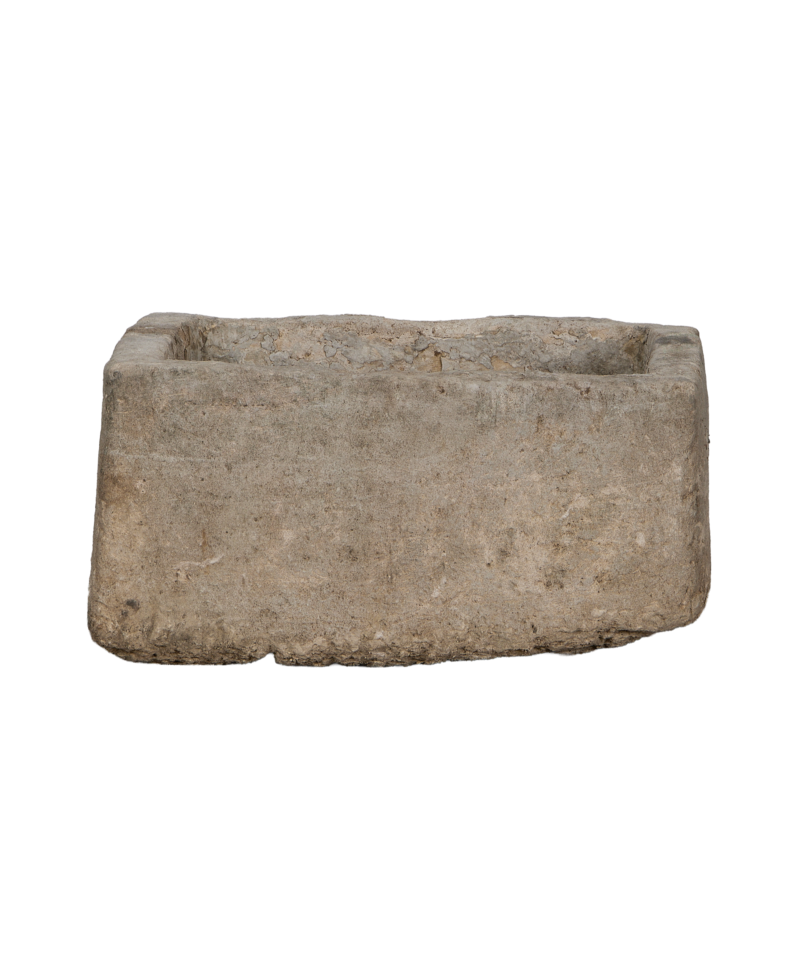 Vintage Indonesian limestone trough, rectangular, from a lower side angle, showcasing rustic texture.
