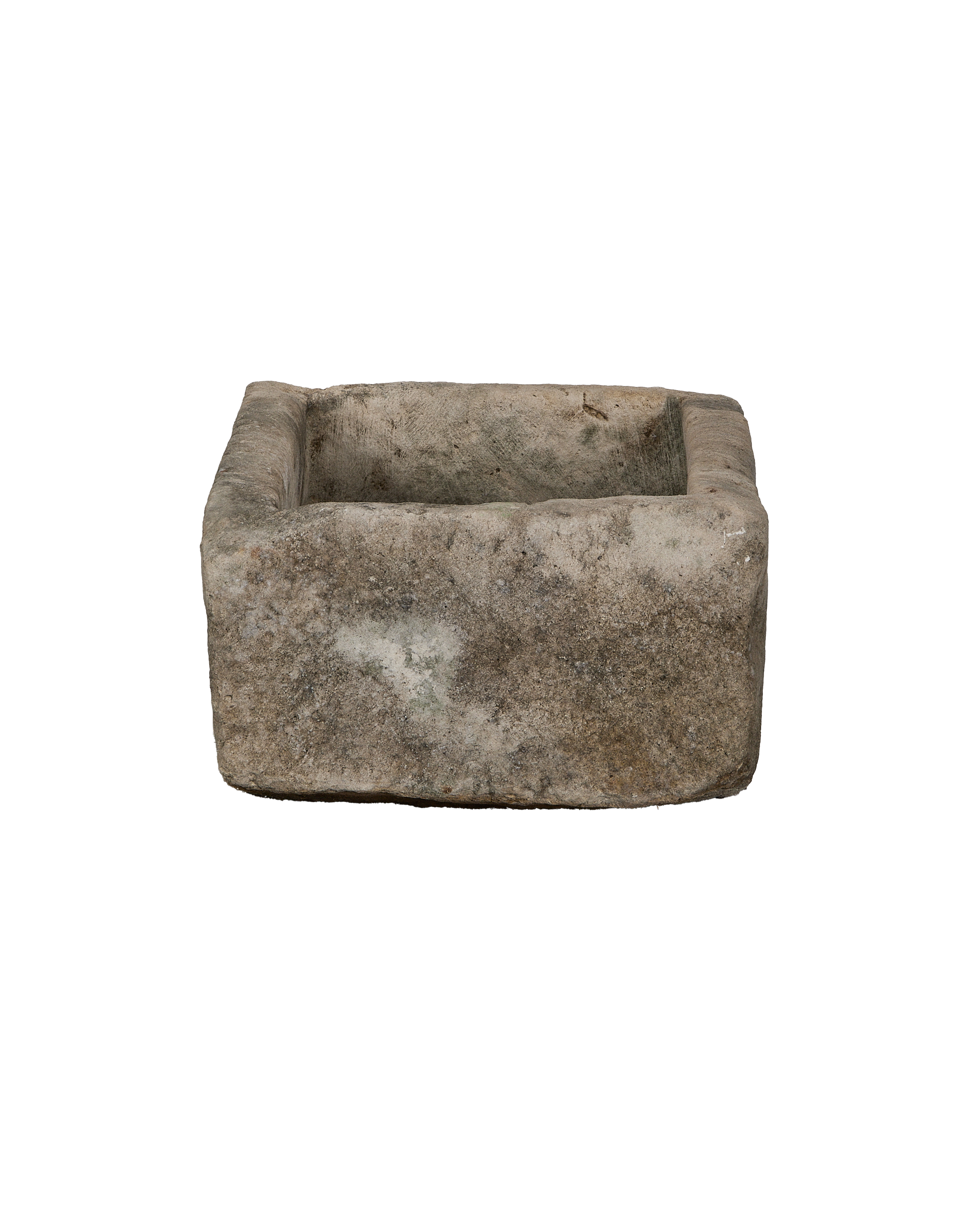 Vintage Indonesian limestone trough showing weathered, textured surface and rectangular shape.