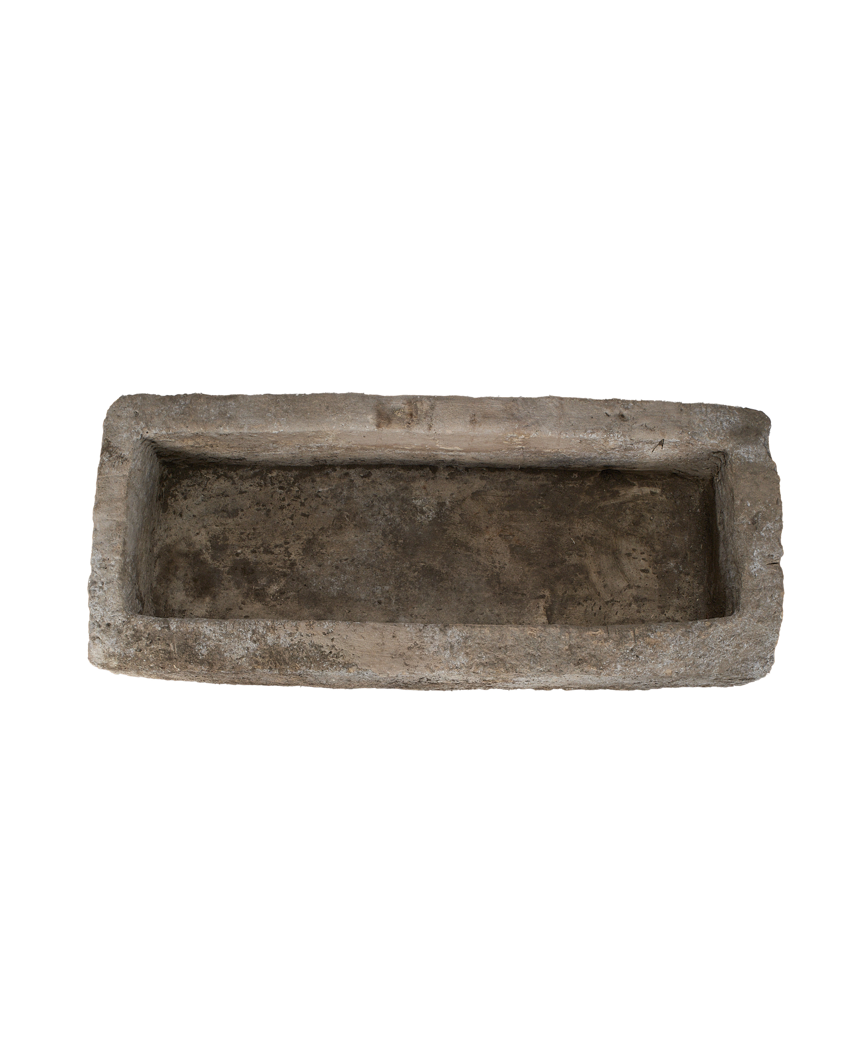 Vintage Indonesian limestone trough, top-down view showing rectangular basin with rustic texture.