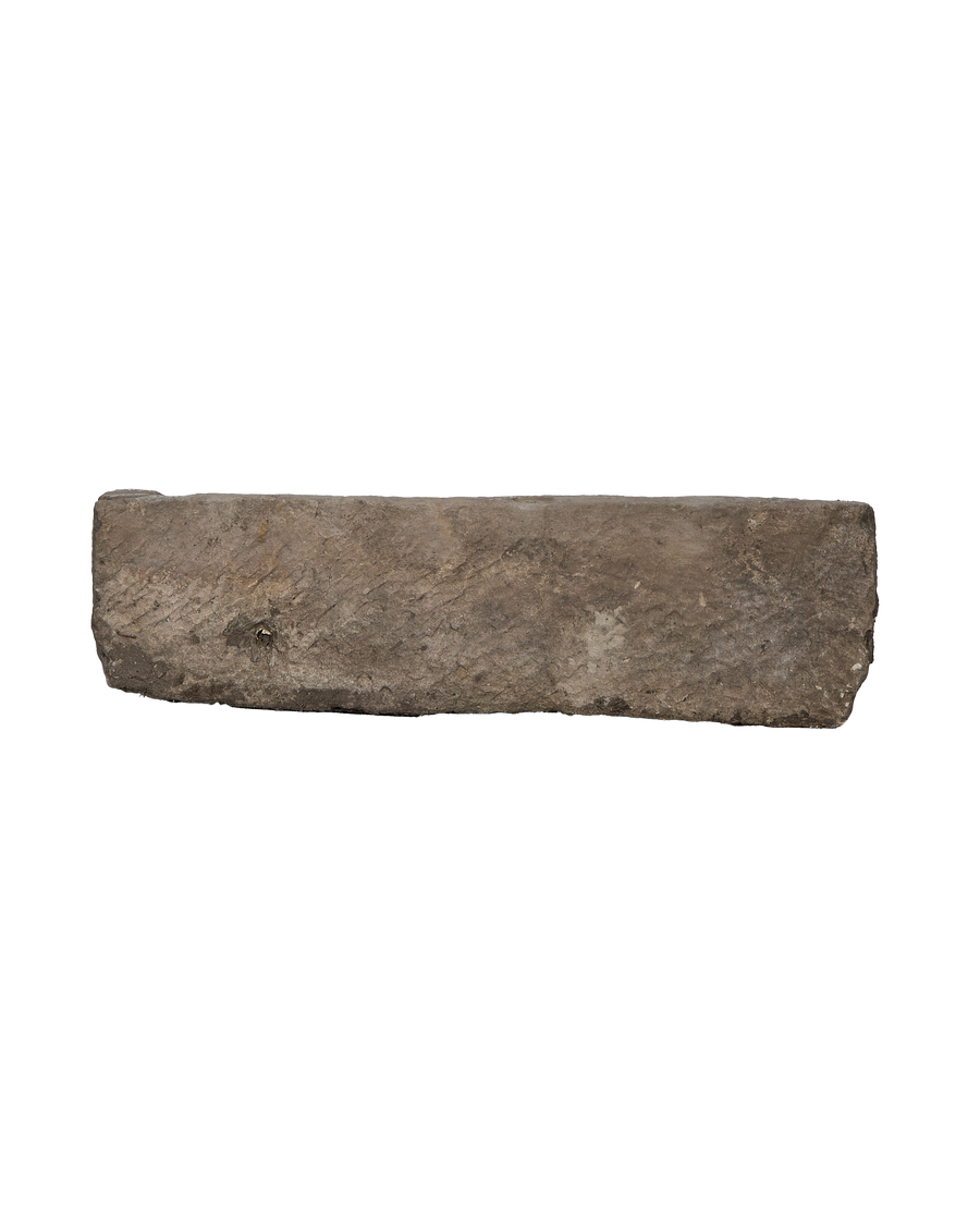 Vintage Indonesian rectangular limestone trough showing rough-hewn oak texture, dark gray color.