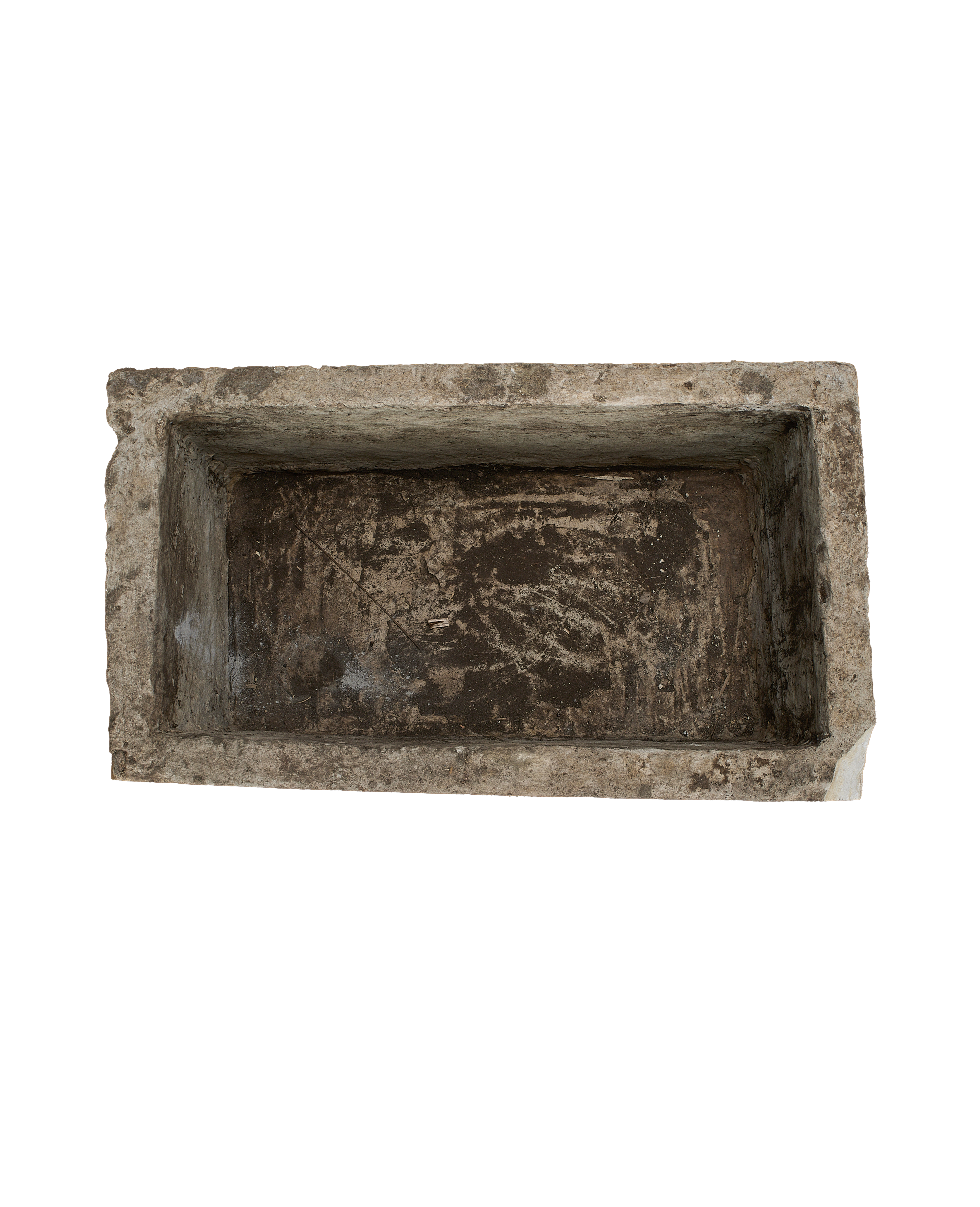 Vintage Indonesian rectangular limestone trough, top view showing weathered interior texture.
