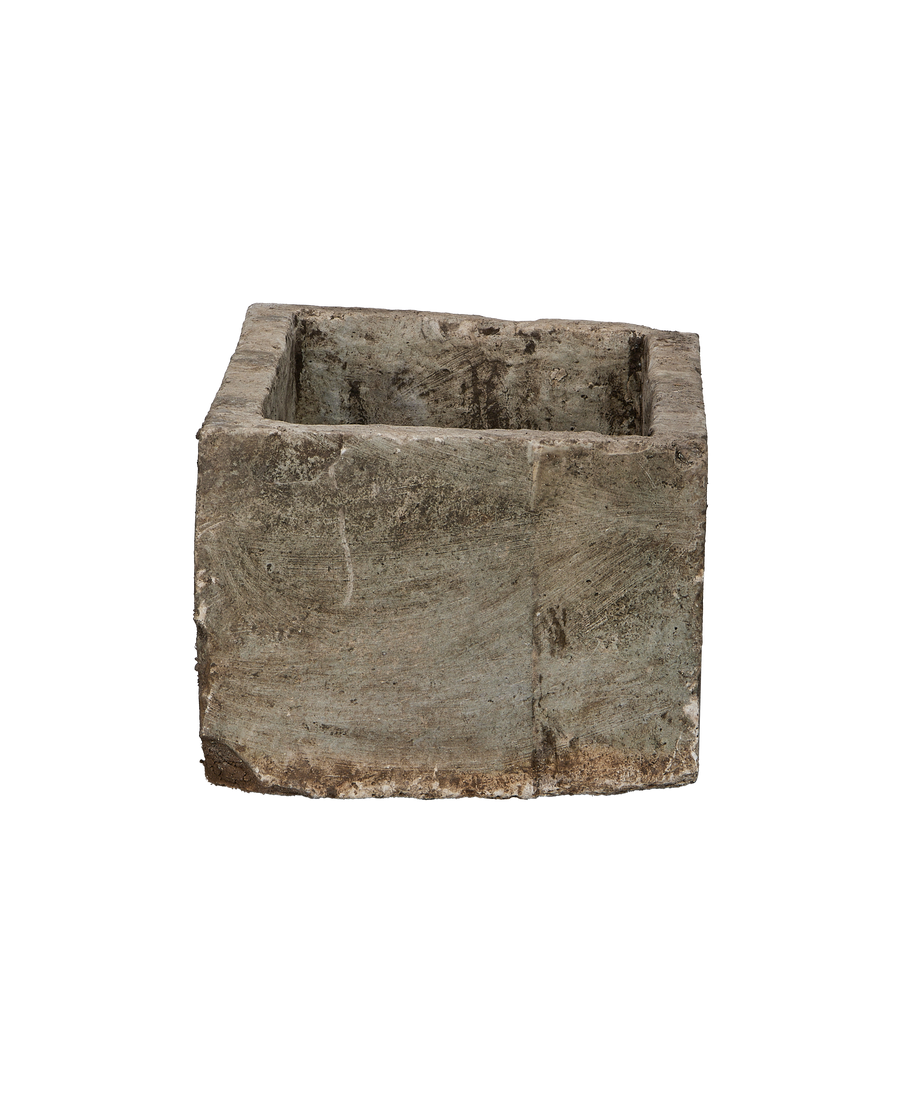 Vintage Indonesian limestone trough (OAK), rectangular, showing its weathered, stone interior.